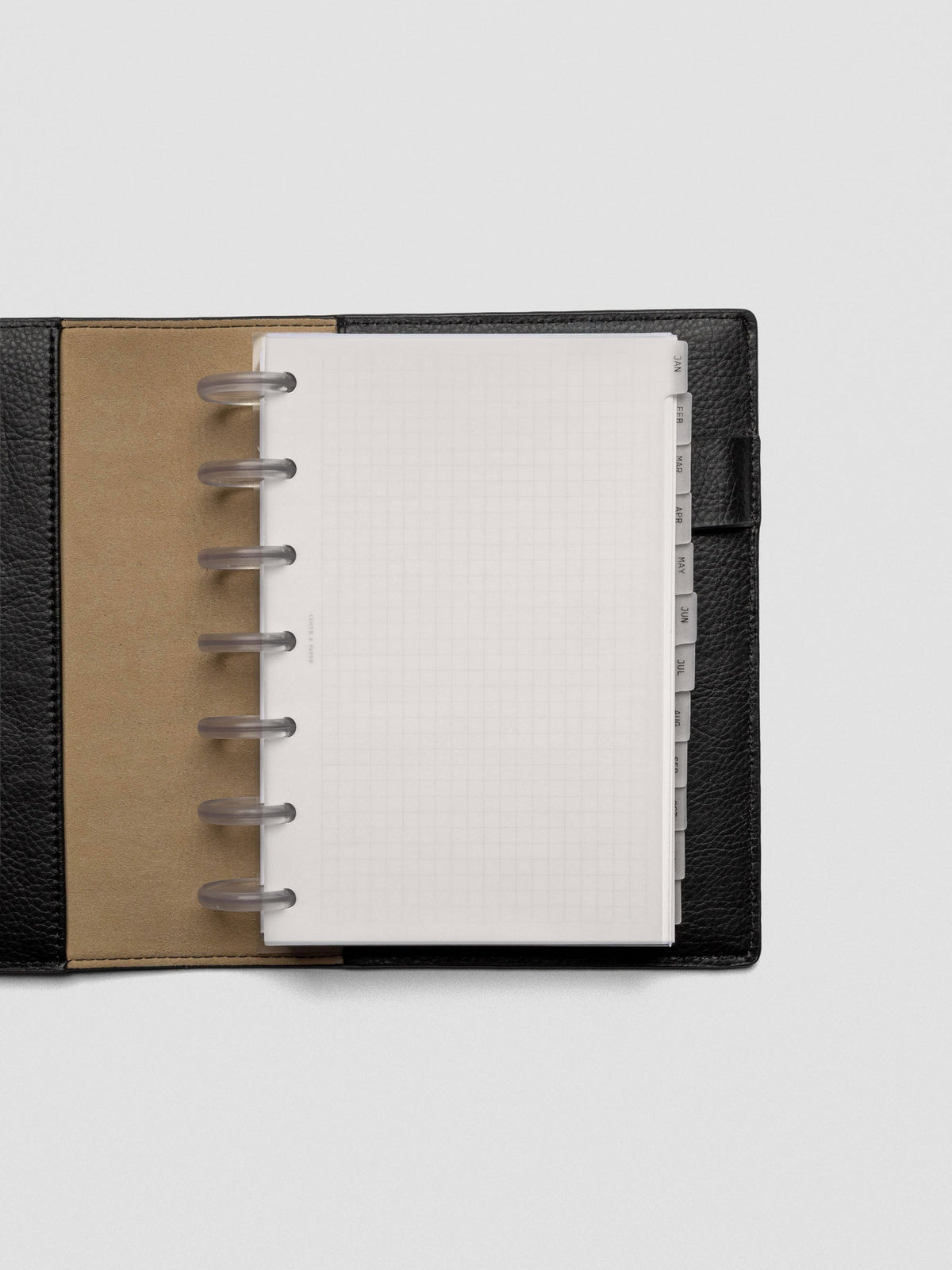 HP Mini vellum dividers shown bound with rings in an agenda.