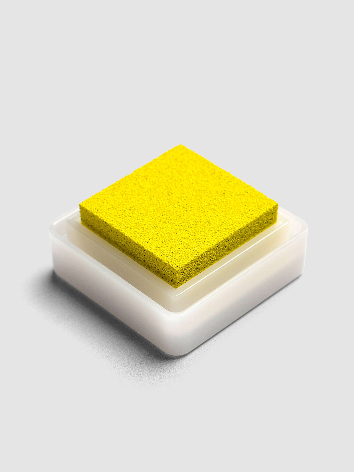 Artnic Stamp Ink Pad in citron seen from the side with cover removed