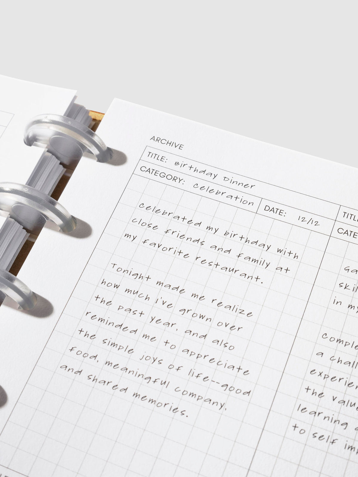 Closeup of inserts inside a leather planner.
