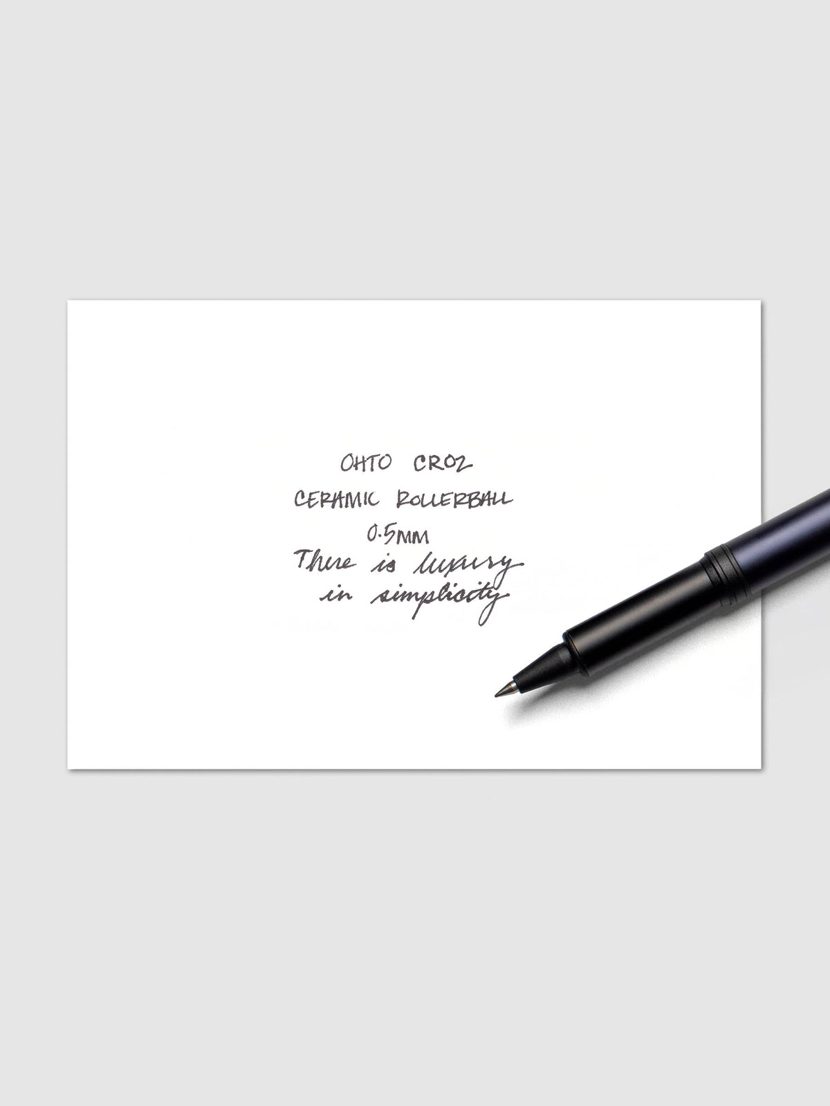 OHTO CR02 Ceramic Rollerball Pen | 0.5 mm writing sample with matte blue.