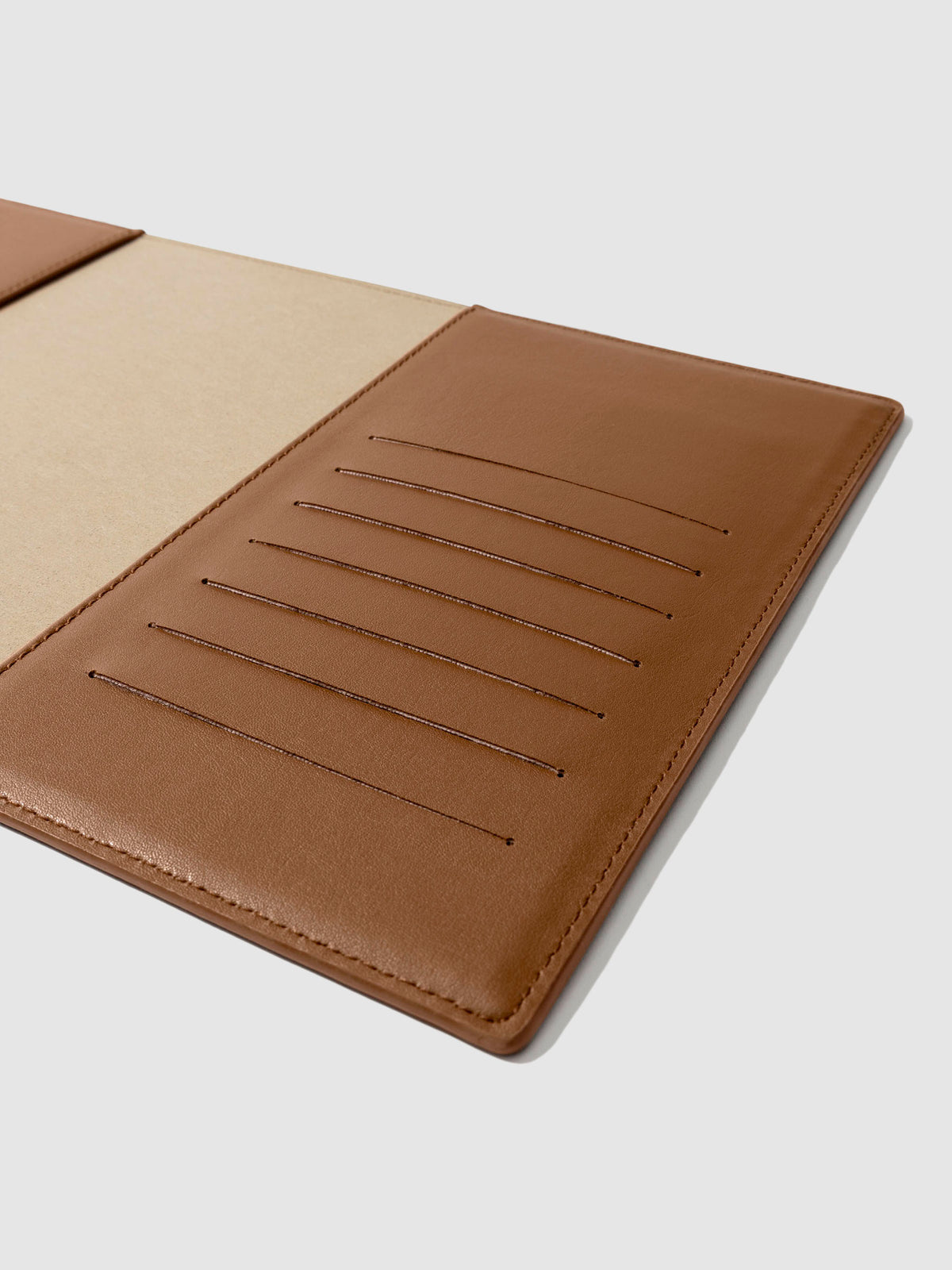 Closeup of folio's credit card slots. Color pictured is clay brown.