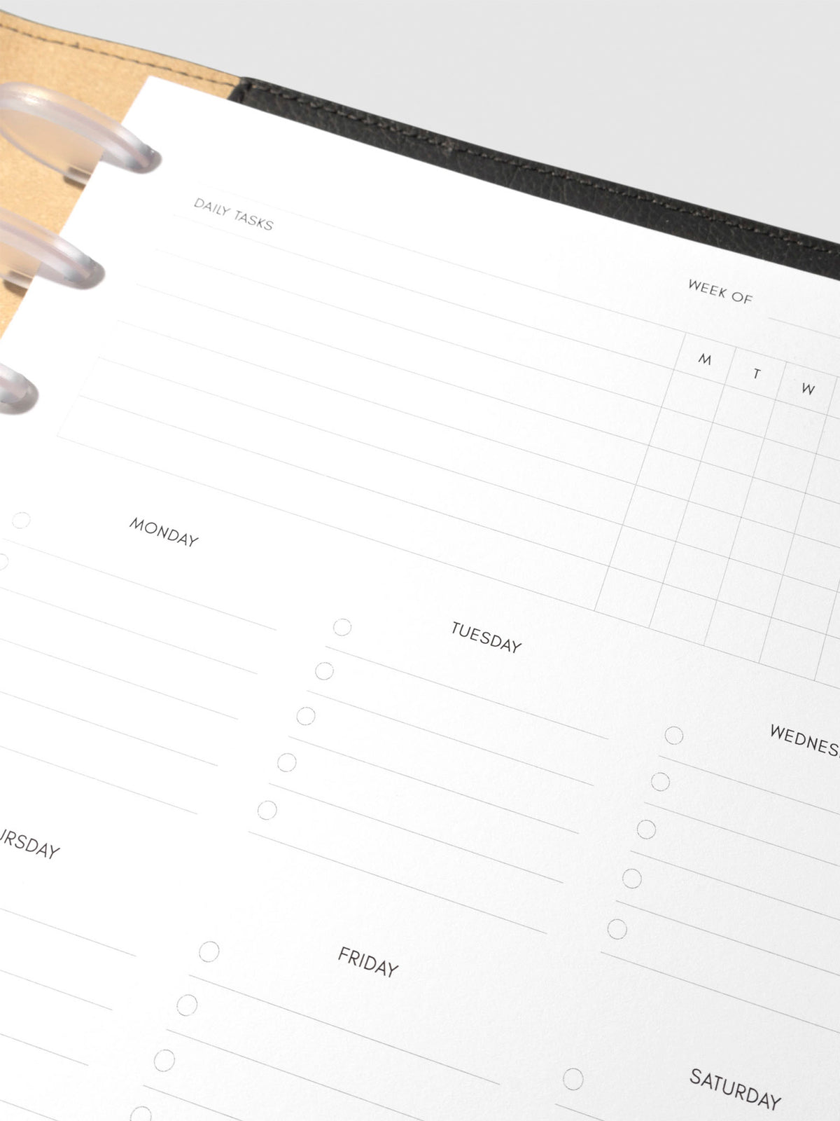 Insert in use inside a black leather planner.