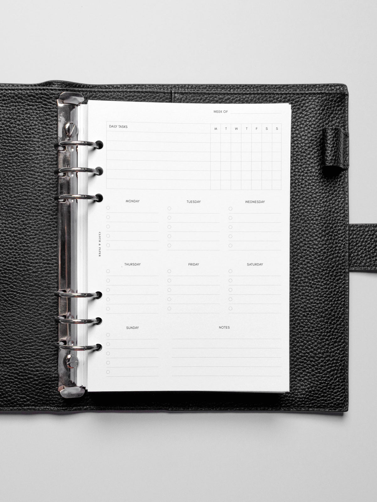Insert in use inside a black leather planner.
