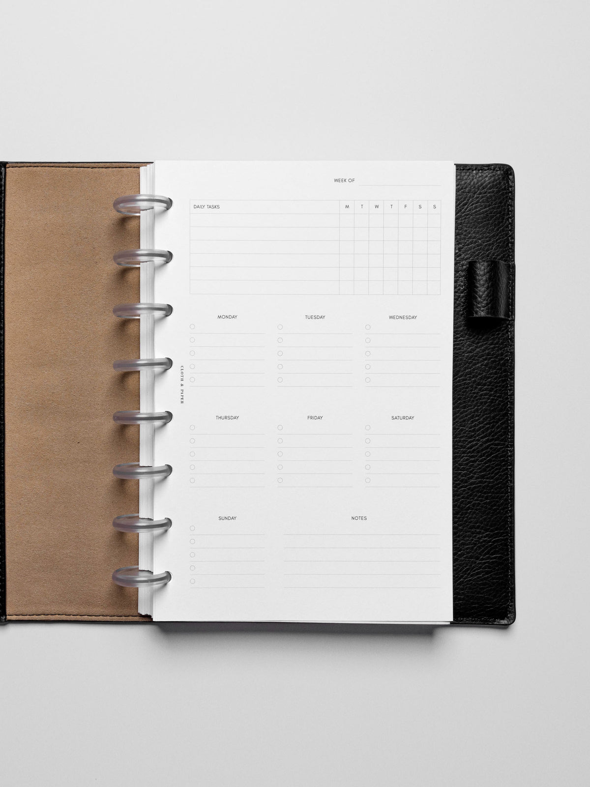 Insert in use inside a black leather planner.