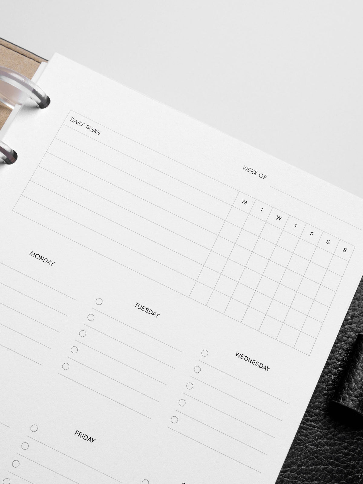Insert in use inside a black leather planner.