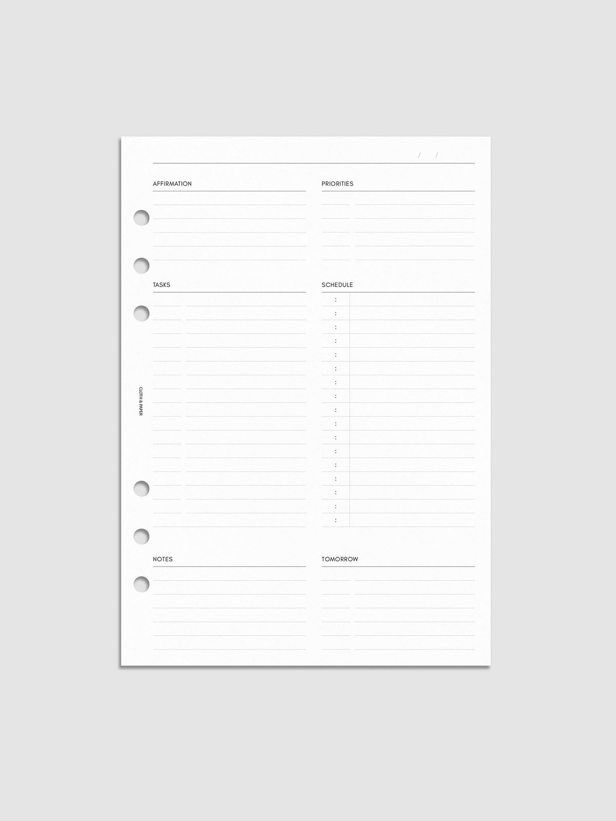 Daily Essentials Planner Inserts digital mockup in size A5, pre-punched for 6-ring binders. Includes headers for affirmations, priorities, tasks, schedule, notes, and tomorrow.