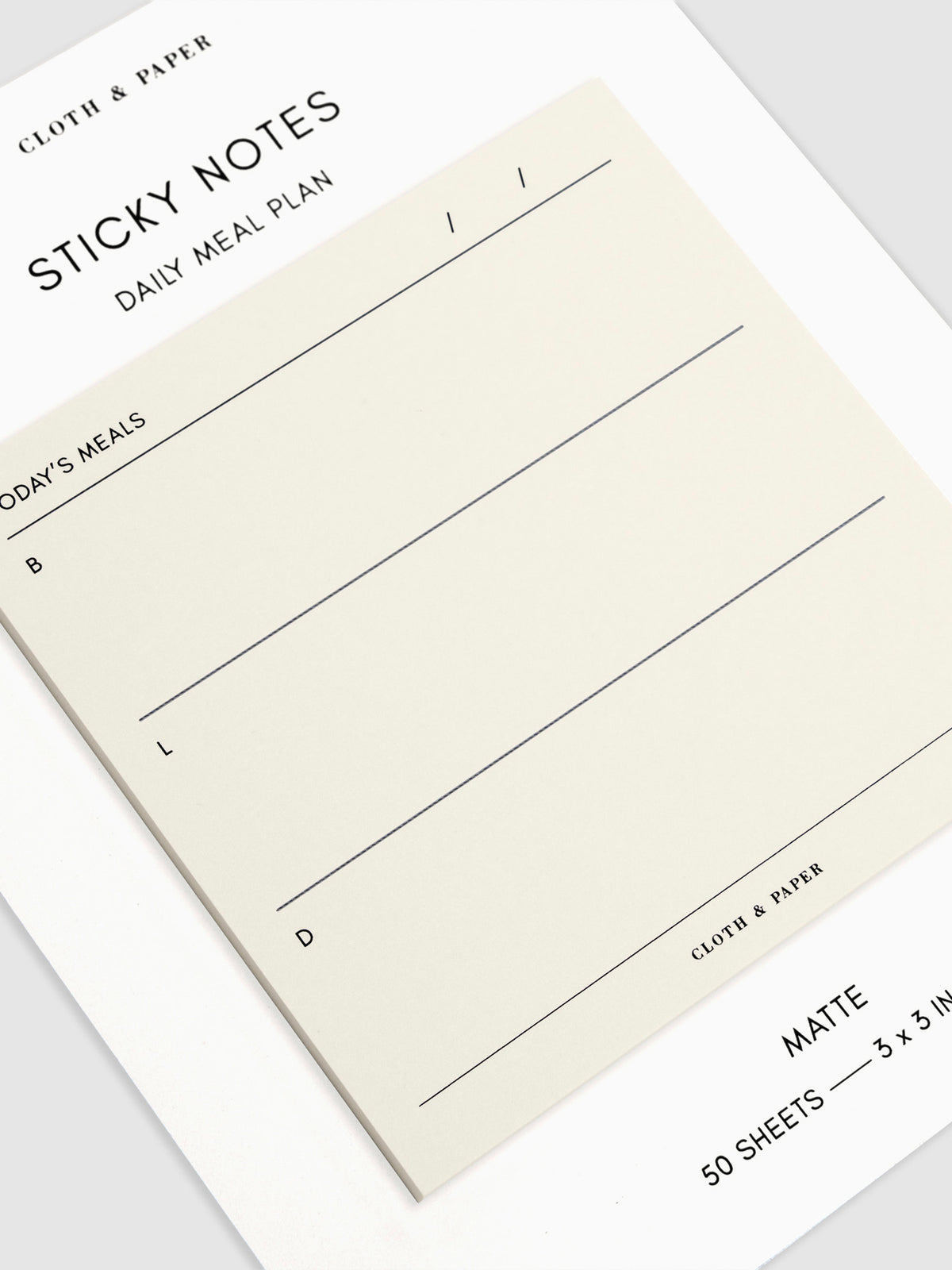 Close-up of a Daily Meal Plan Sticky Notes on their backing, against a neutral background.