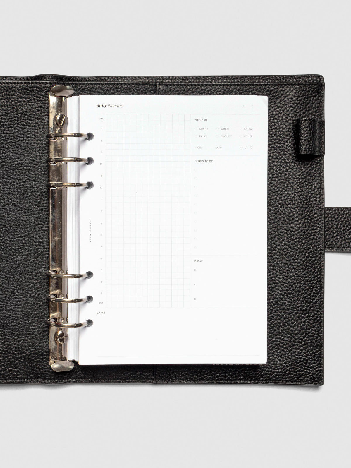 Insert in use inside a black leather folio.
