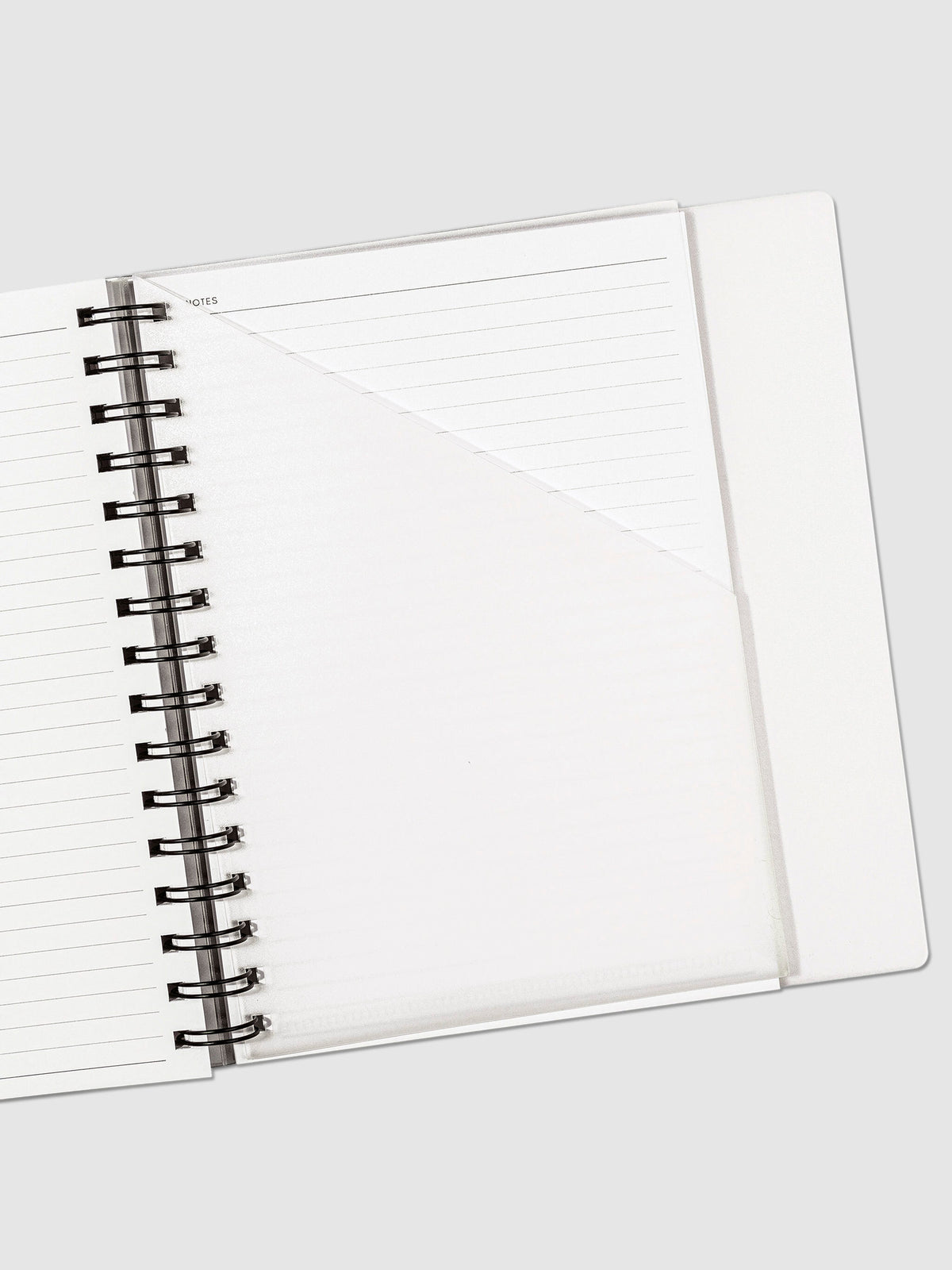 A5 Spiral folder in use inside a lined notebook