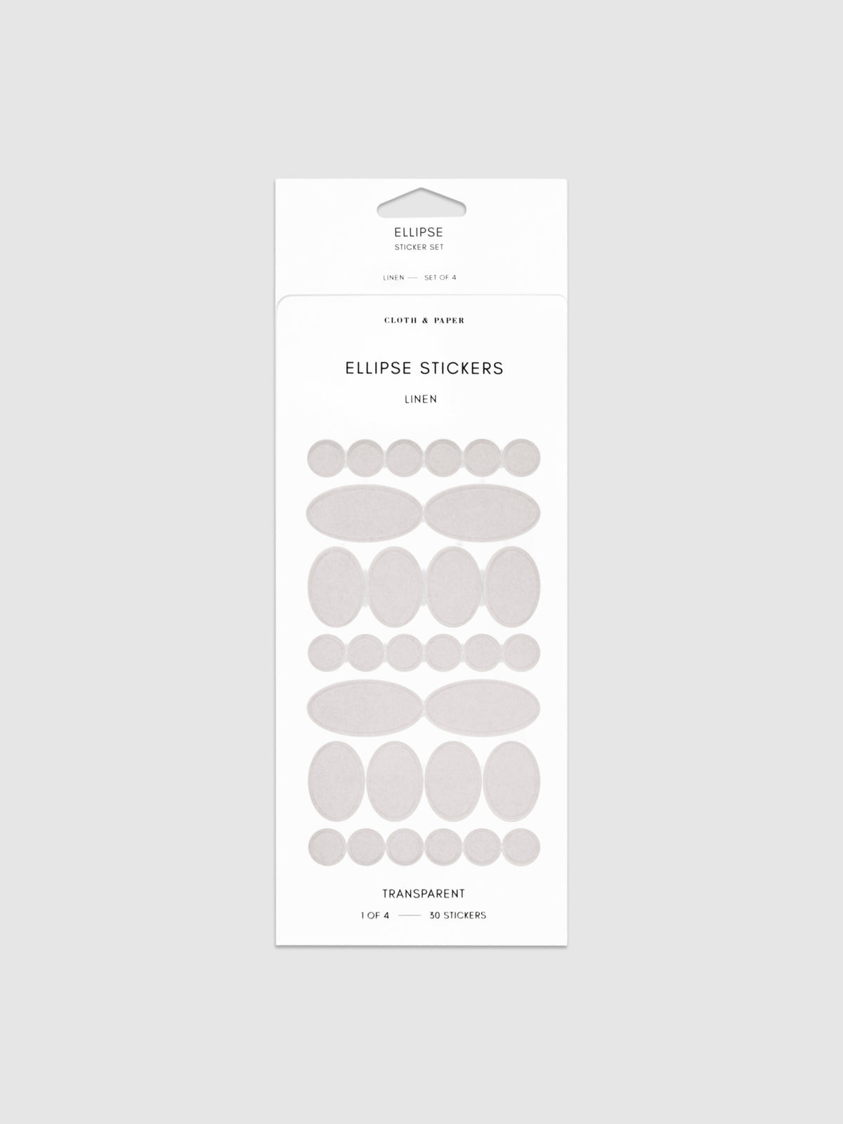 Linen stickers in their packaging on a neutral background.