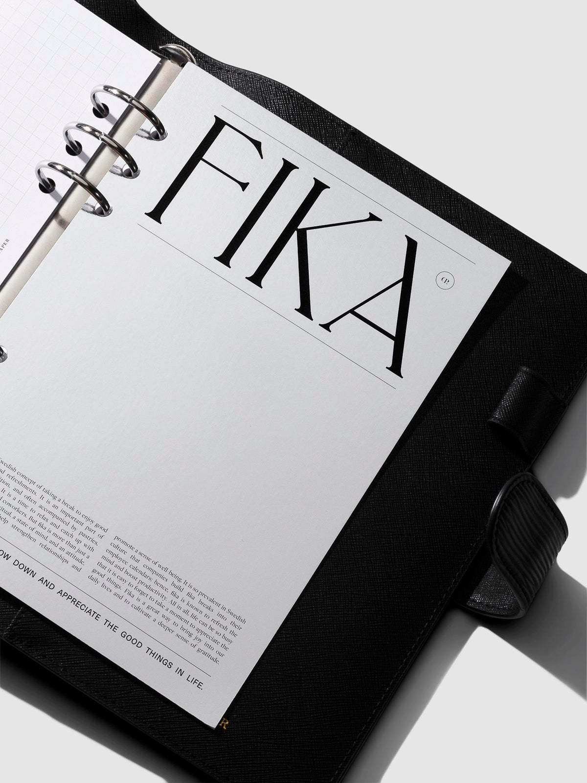 Dashboard in use inside a black leather agenda.