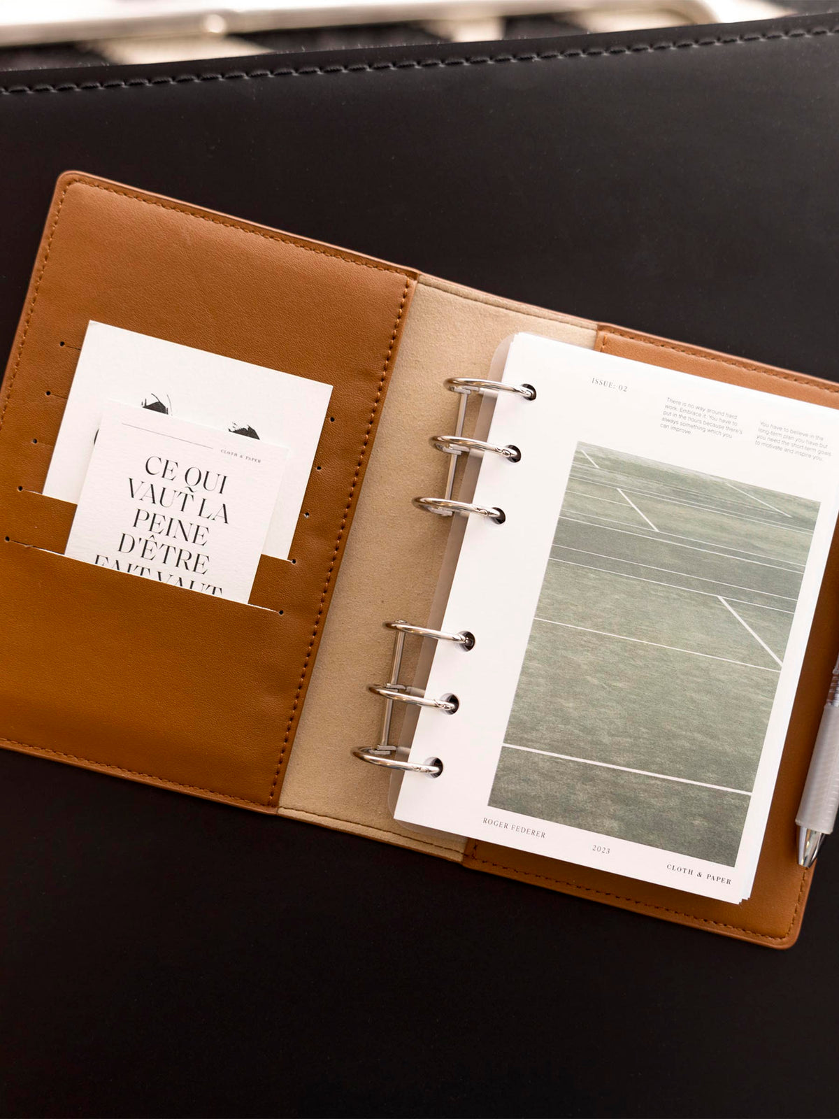 CP Petite/A6 cover displayed inside a brown leather folio with silver rings. Size shown is A6.
