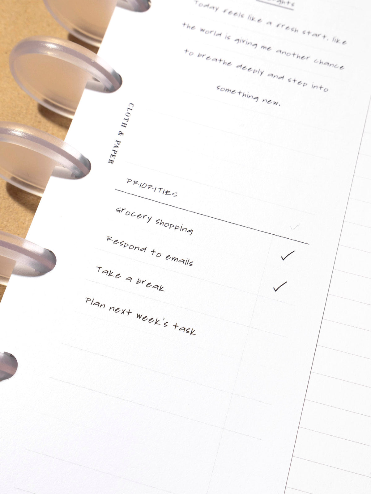 Insert in use inside a leather planner. It has sample text filled out.
