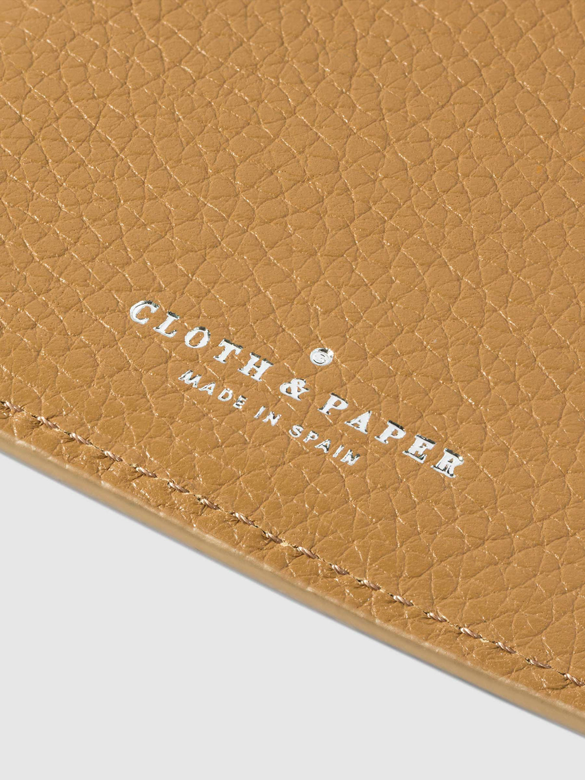 Closeup of Catalonia folio's foil-stamped Cloth and Paper Made in Spain logo.