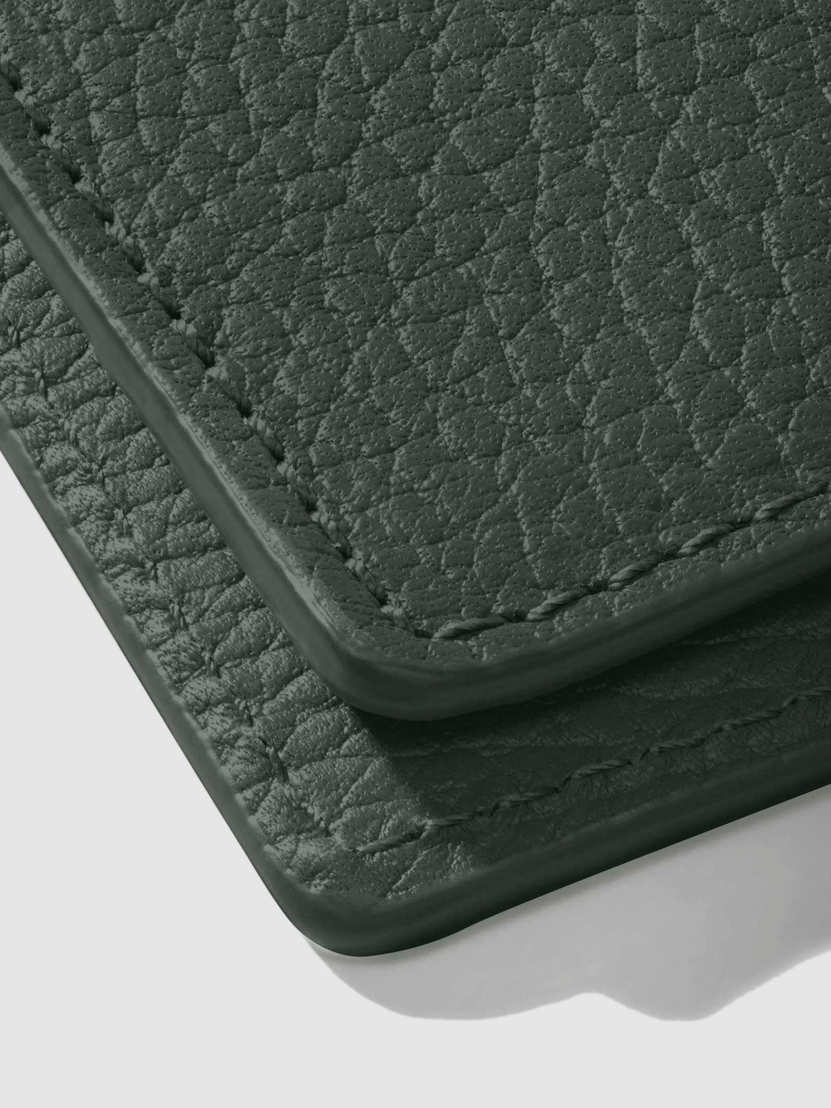 Closeup of glazing on leather folio.