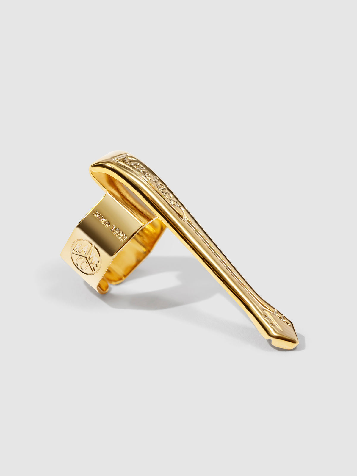 Nostalgic gold clip displayed on a neutral background. Closeup of text reads "Since 1883" and the Kaweco logo is visible on the side of the clip.