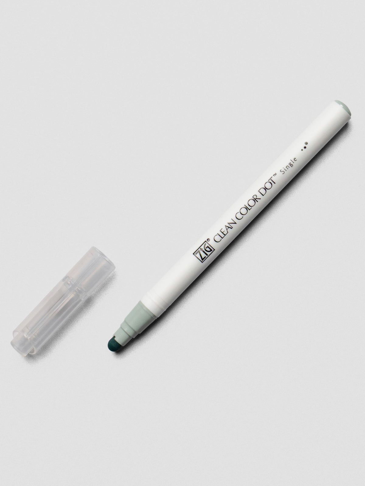 Grayish Green Kuretake ZIG Clean Color Dot Marker shown uncapped at an angle on a light background.
