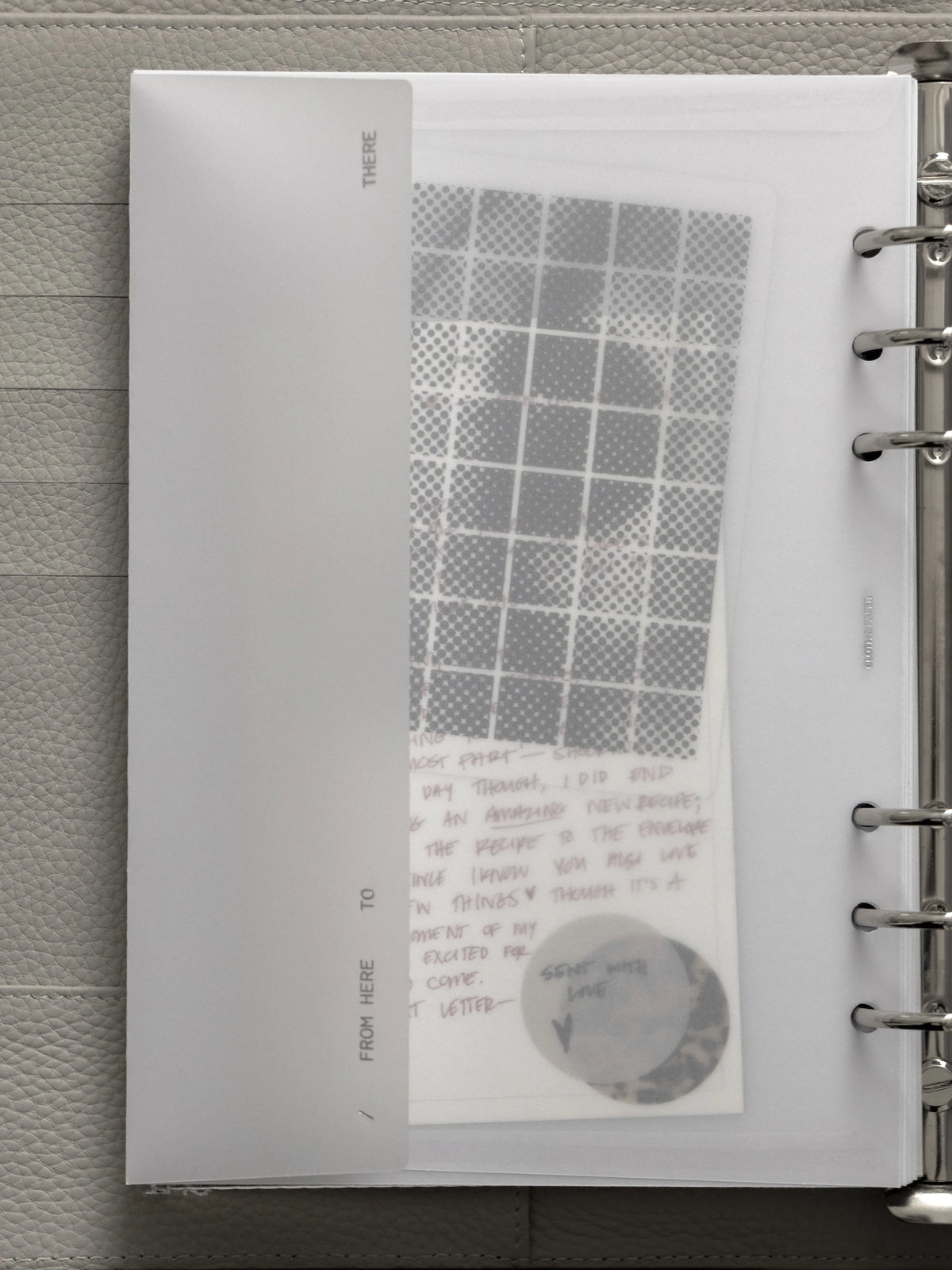 White Envelope Storage Holder shown in use with additional Cloth & Paper products.