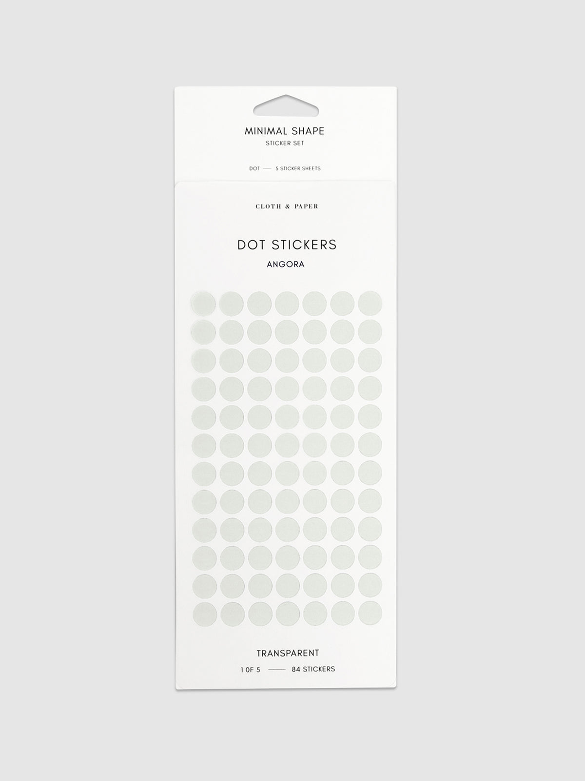 Angora dot stickers in their packaging on a neutral background.