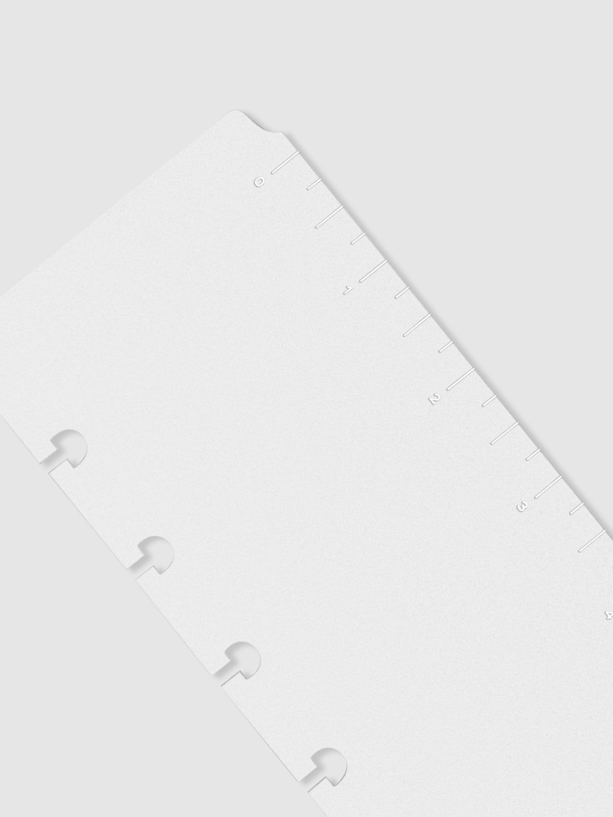 Closeup of page marker on a neutral background.