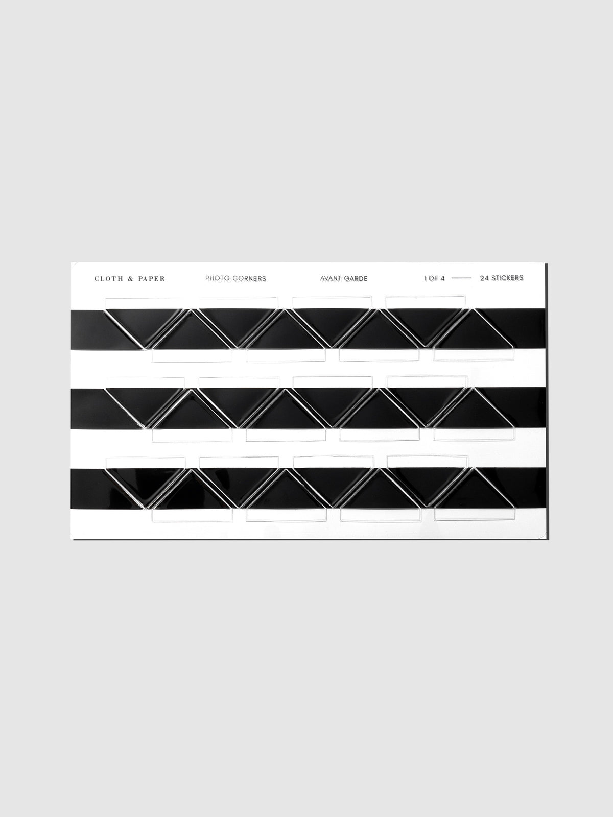 Set of black photo corner stickers displayed on a neutral background.