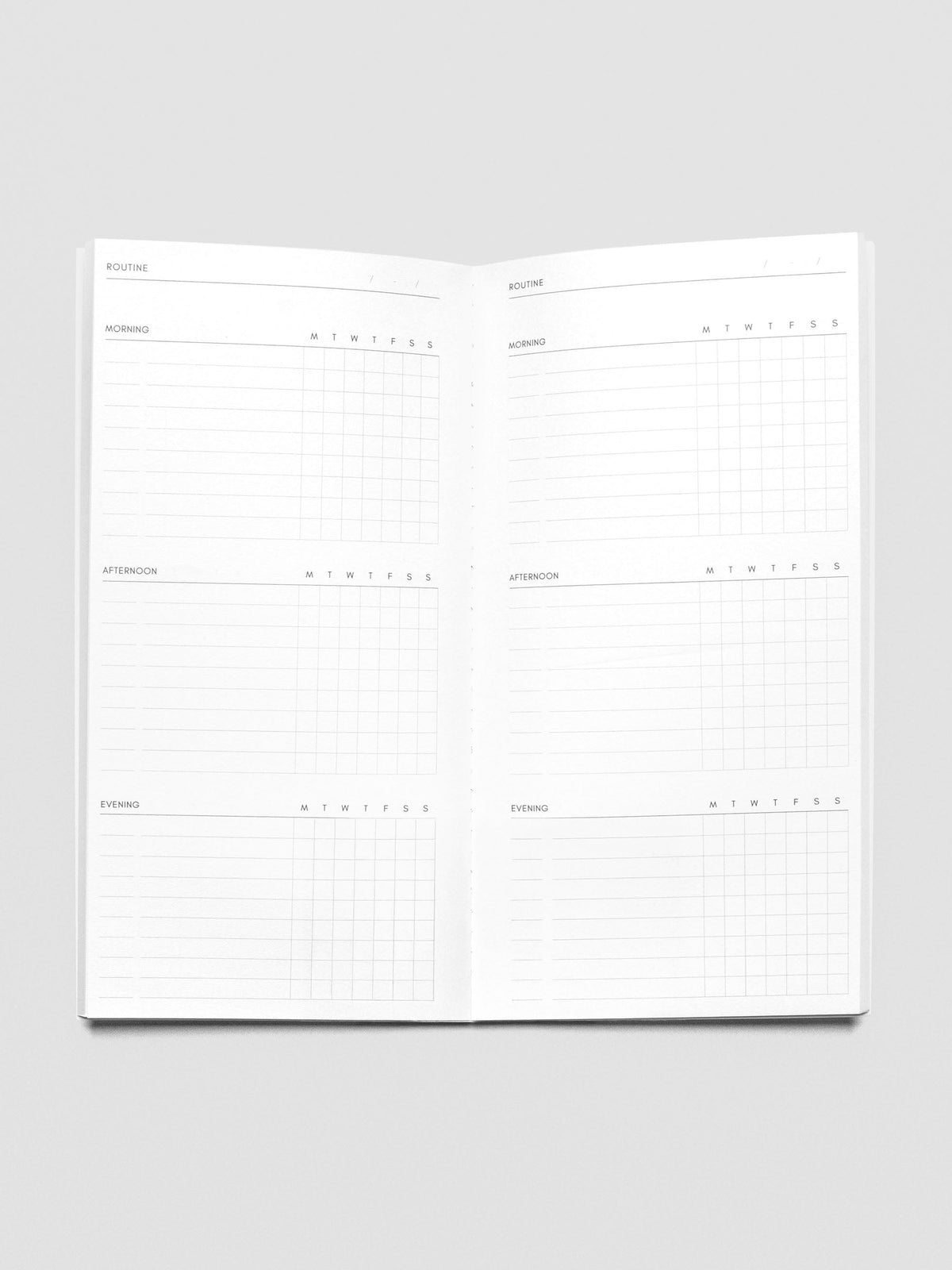 Travel Notebook in size A5 Slim in color Beignet with Routine Builder pages with inner pages shown.