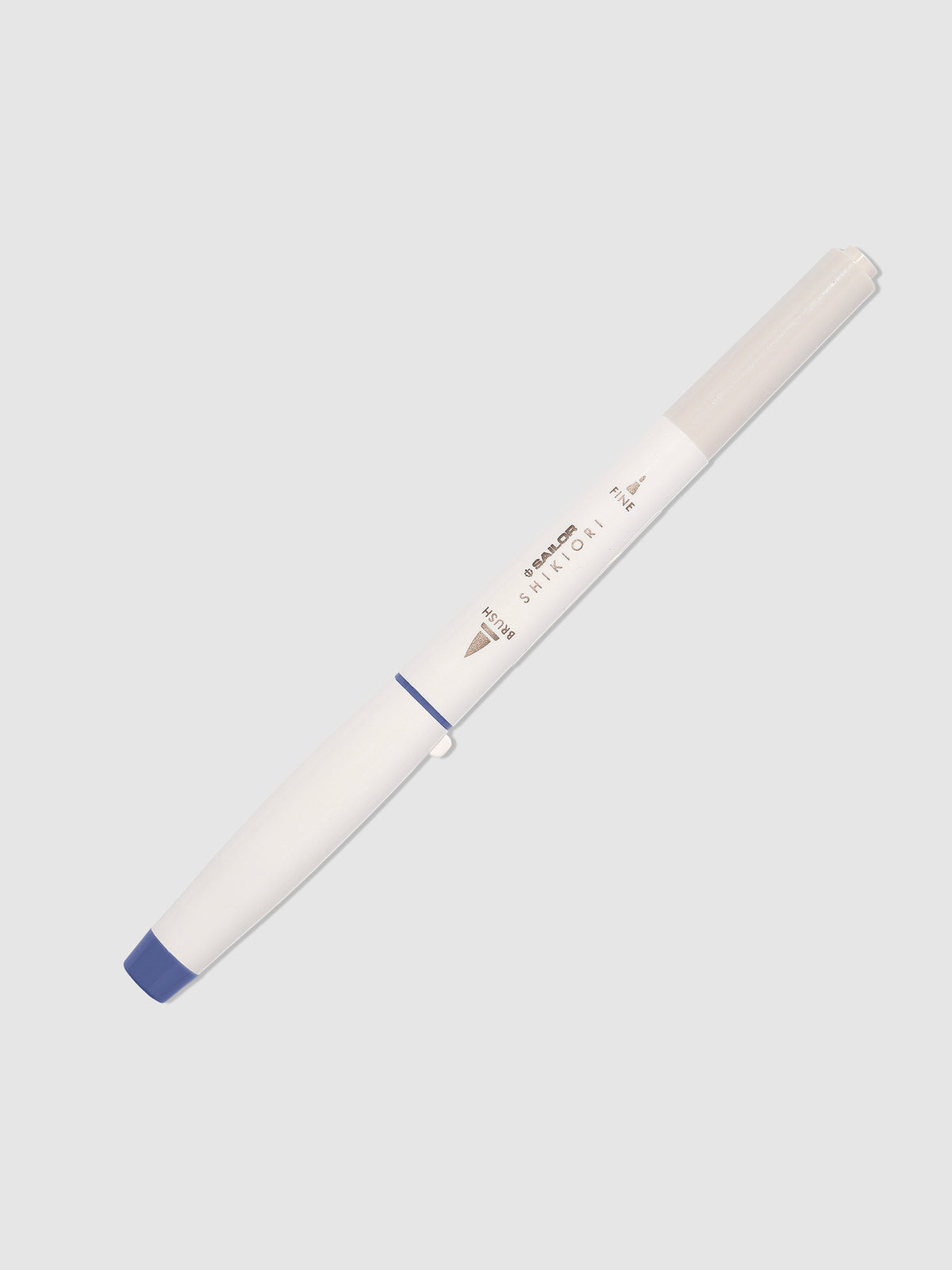 Brush pen displayed on a neutral background. Color pictured is Nioisumire.