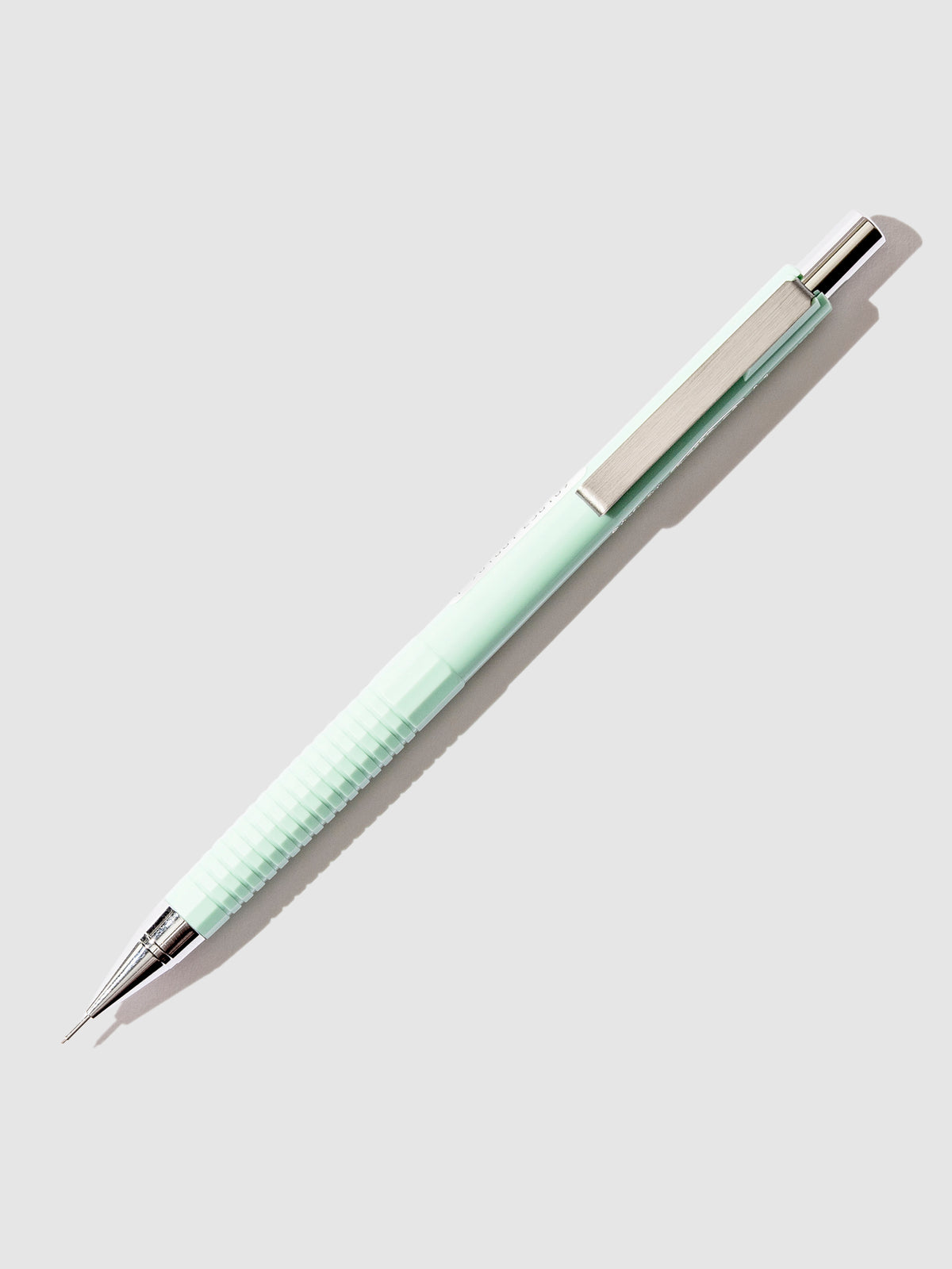 Sakura Craypas Retrico Mechanical Pencil, Cloth and Paper. Mute Green pencil displayed on a neutral background.