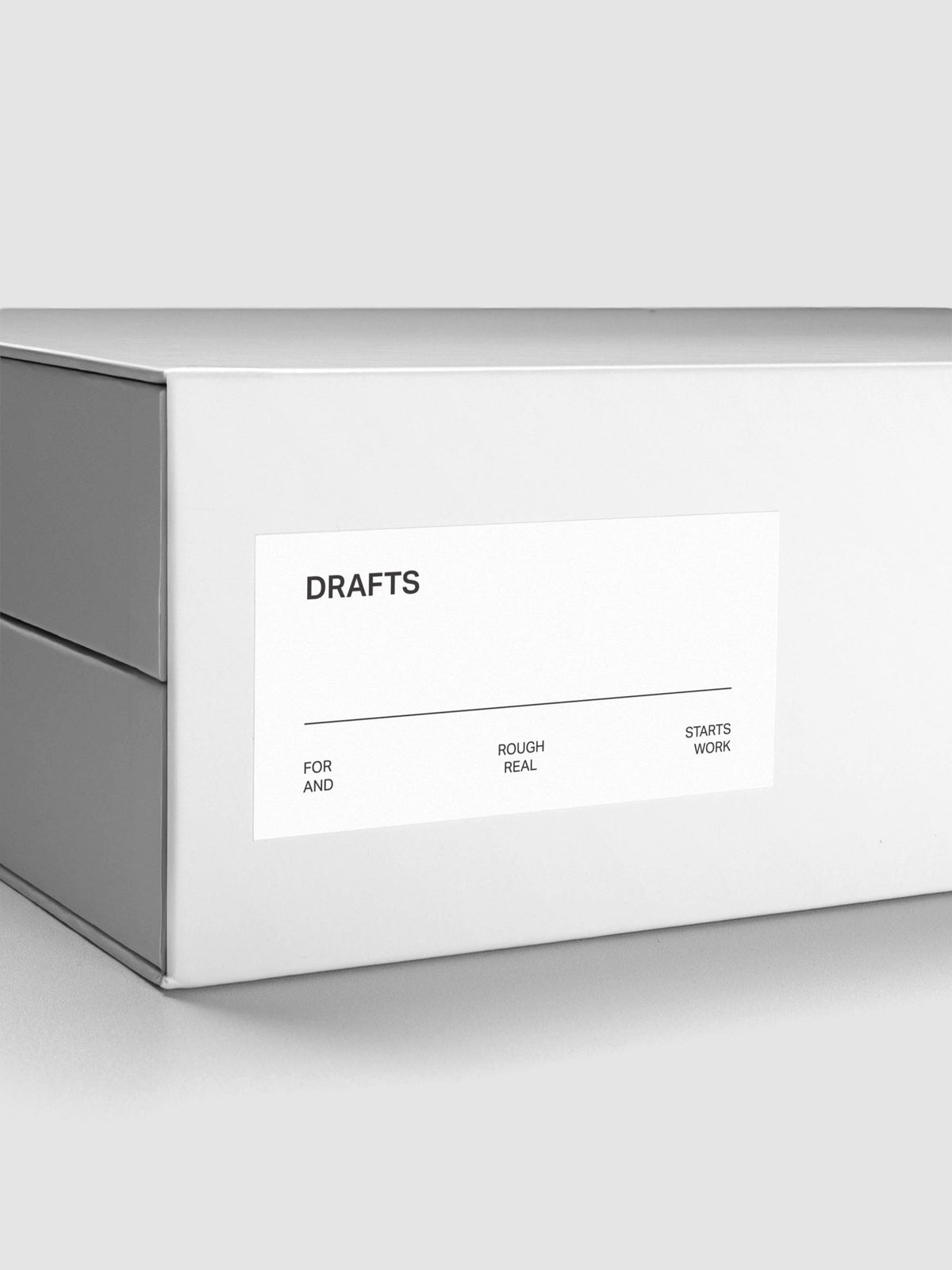Close up view of the spine showing the Drafts label sticker applied to the exterior of the Storage Book 4.0.