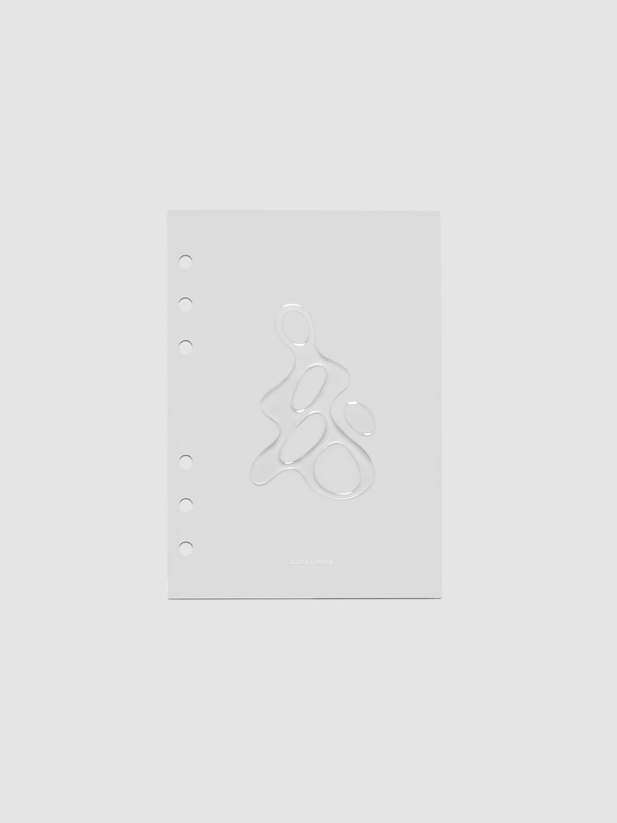Light grey, semi-transparent, and glossy plastic planner dashboard with organic raised shape design in size Personal Wide on a neutral background.