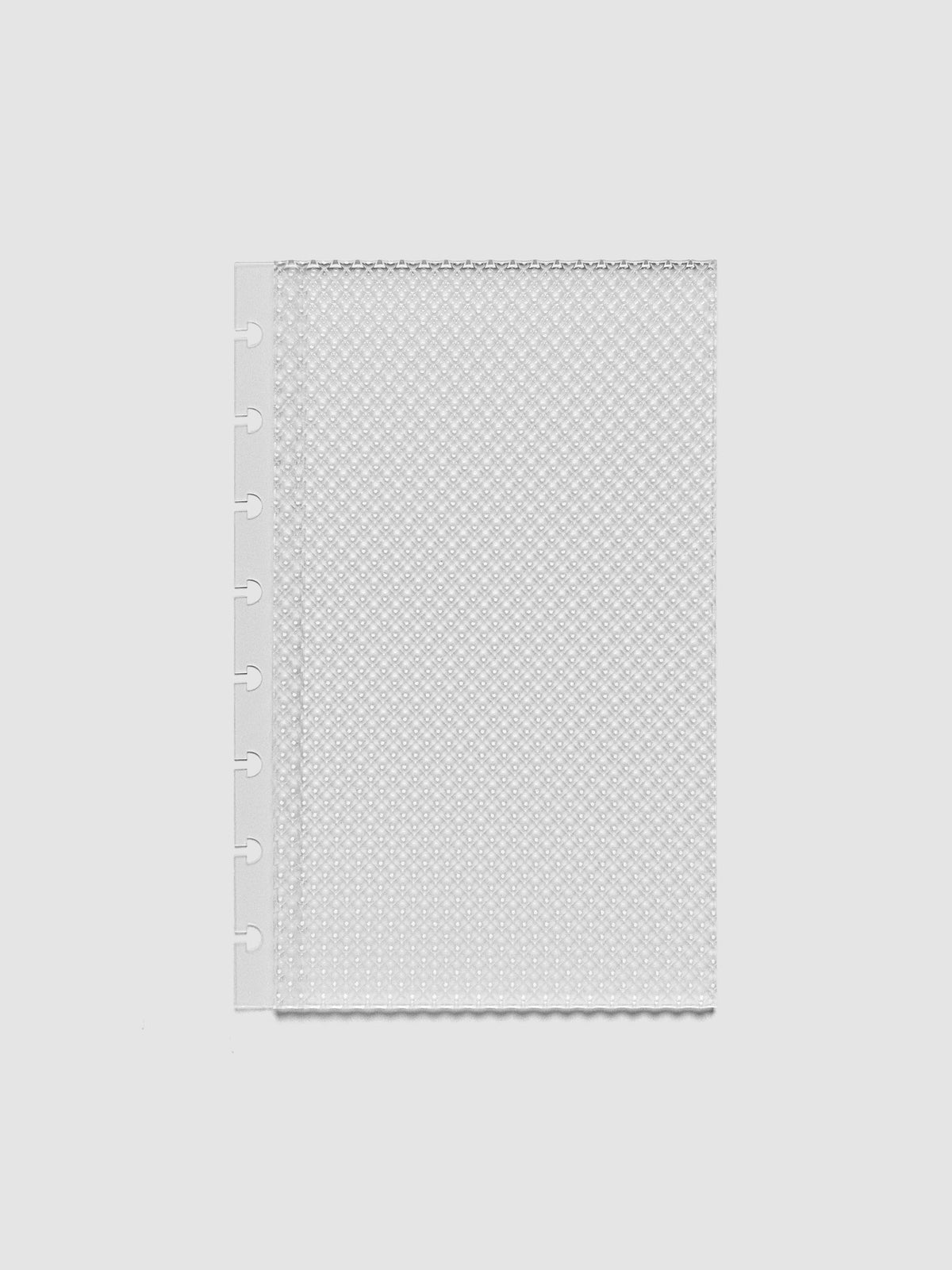 Clear, textured Studded Planner Dashboard in the size Half Letter, on a neutral background.