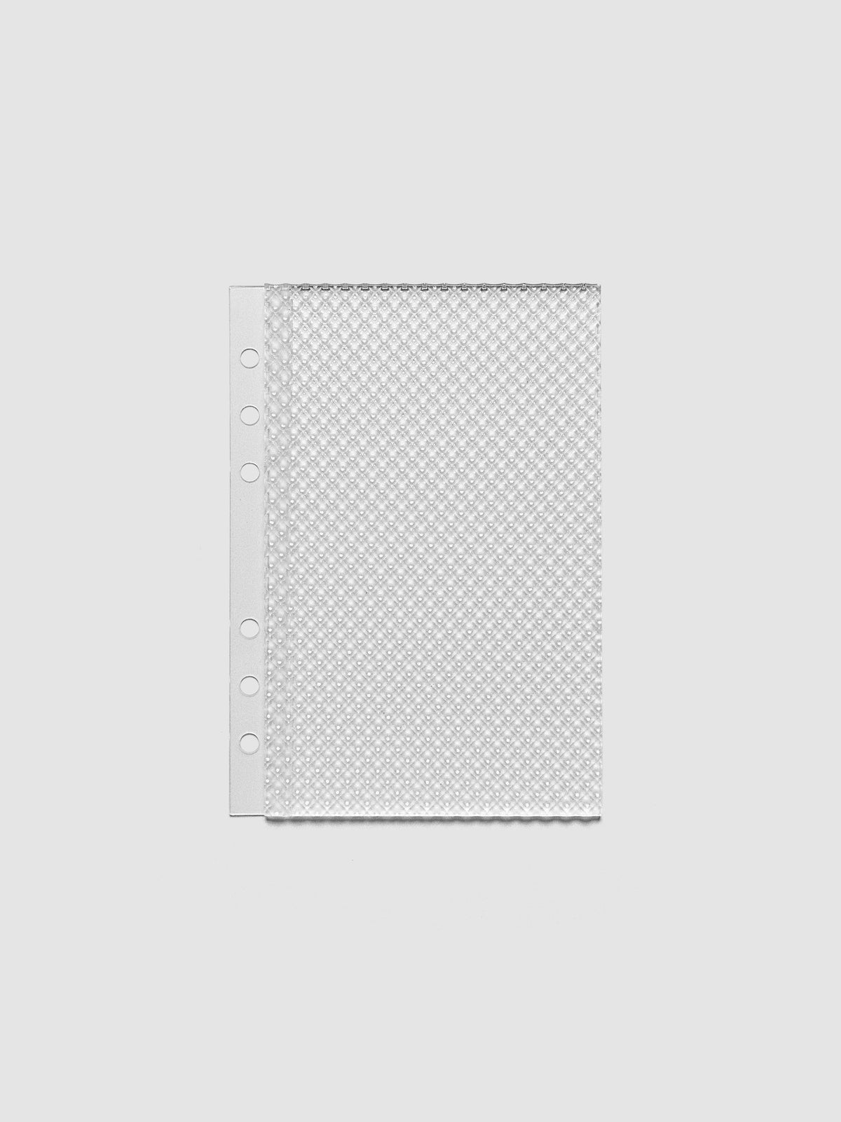 Clear, textured Studded Planner Dashboard in the size Personal Wide, on a neutral background.