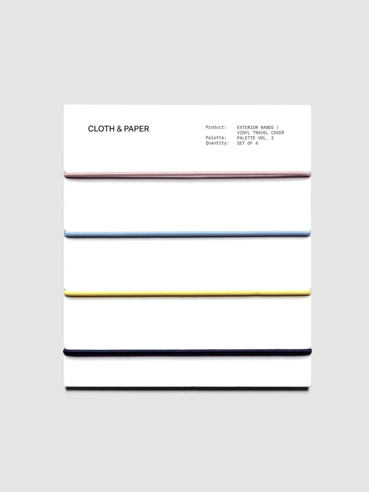 Set of four exterior bands on a backing card in the colors light pink, light blue, yellow, and navy.