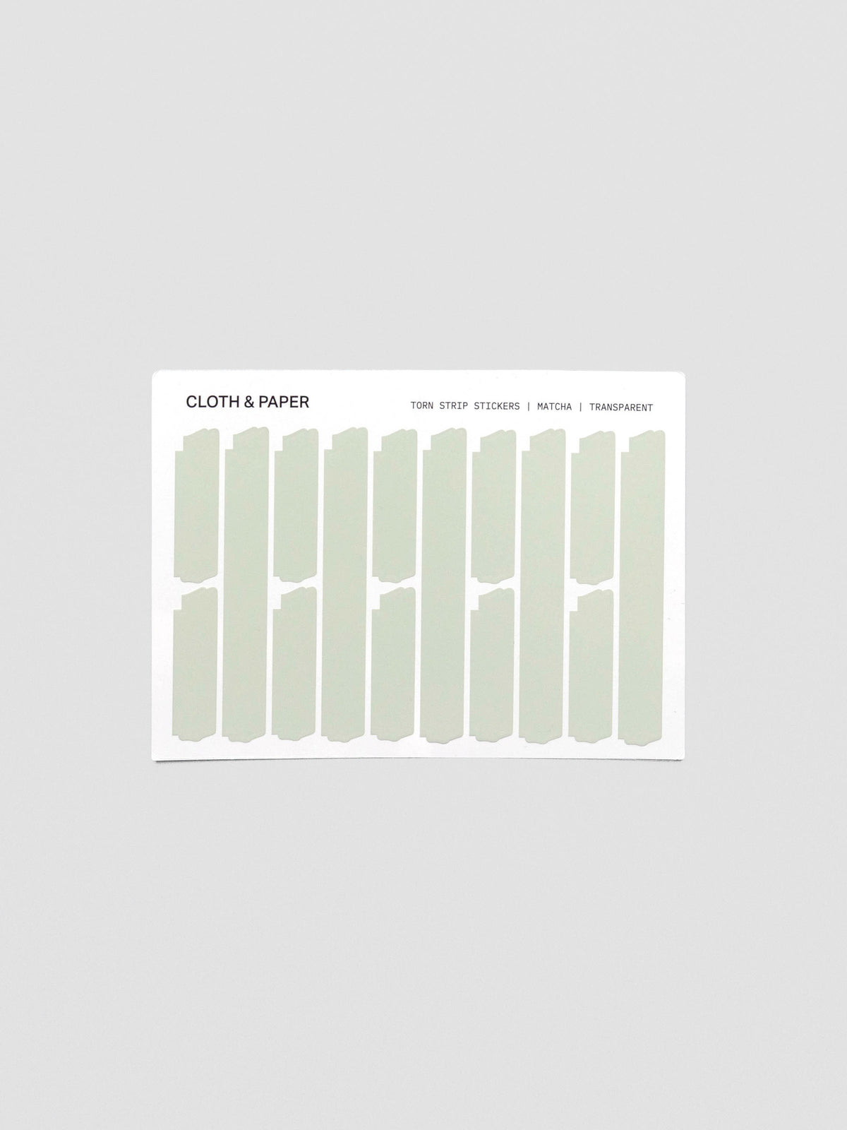 Sheet of Confidential Collection torn strip stickers in matcha green on white background.