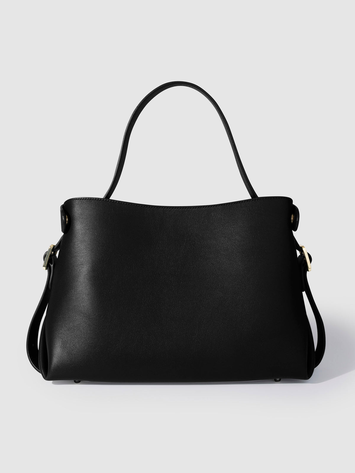 Leather bag displayed on a neutral background. Color shown is Padrillo.
