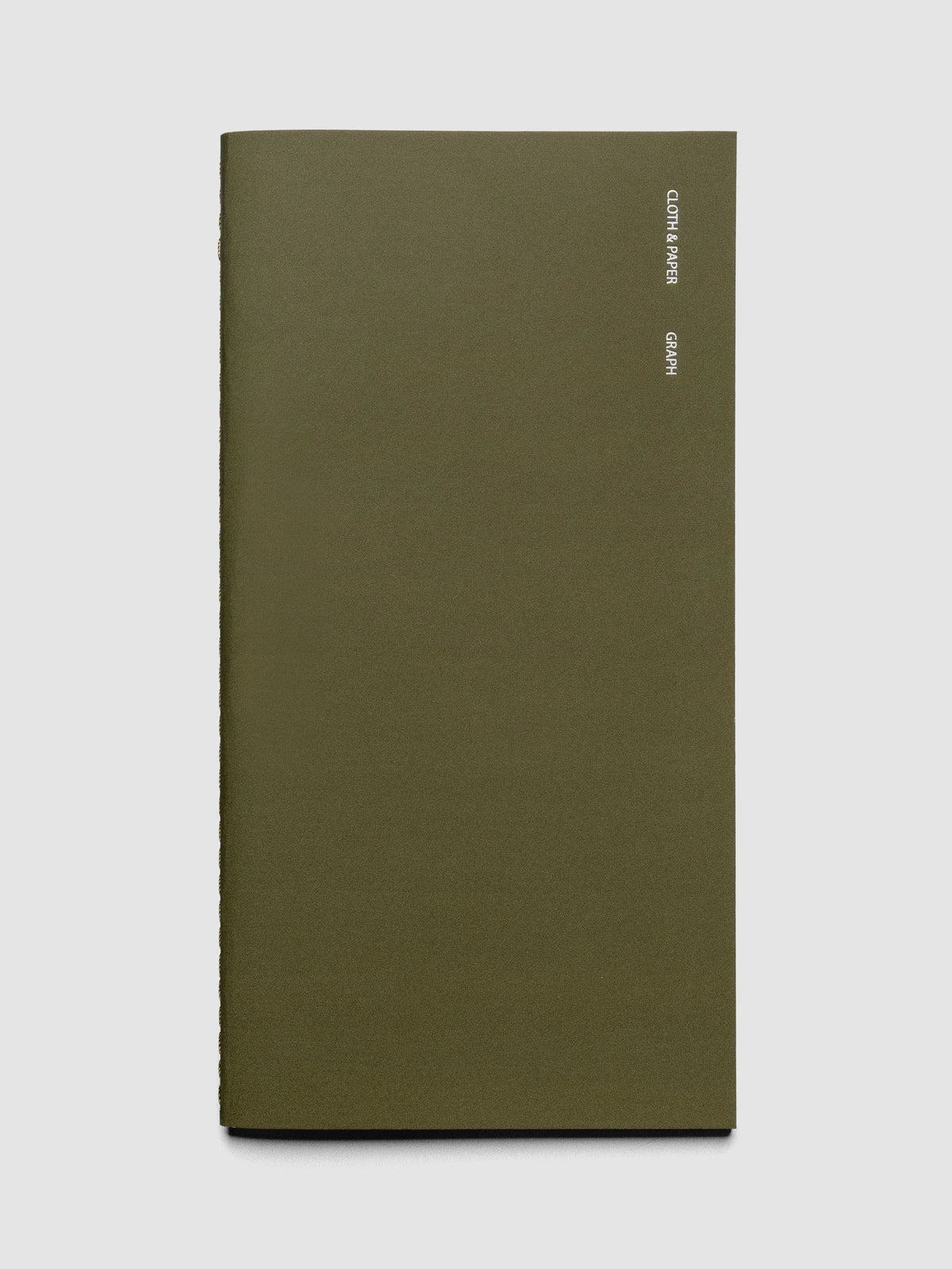 Travel Notebook in size A5 Slim in the color Olive with Graph Note layout shown closed from the front against a neutral background.
