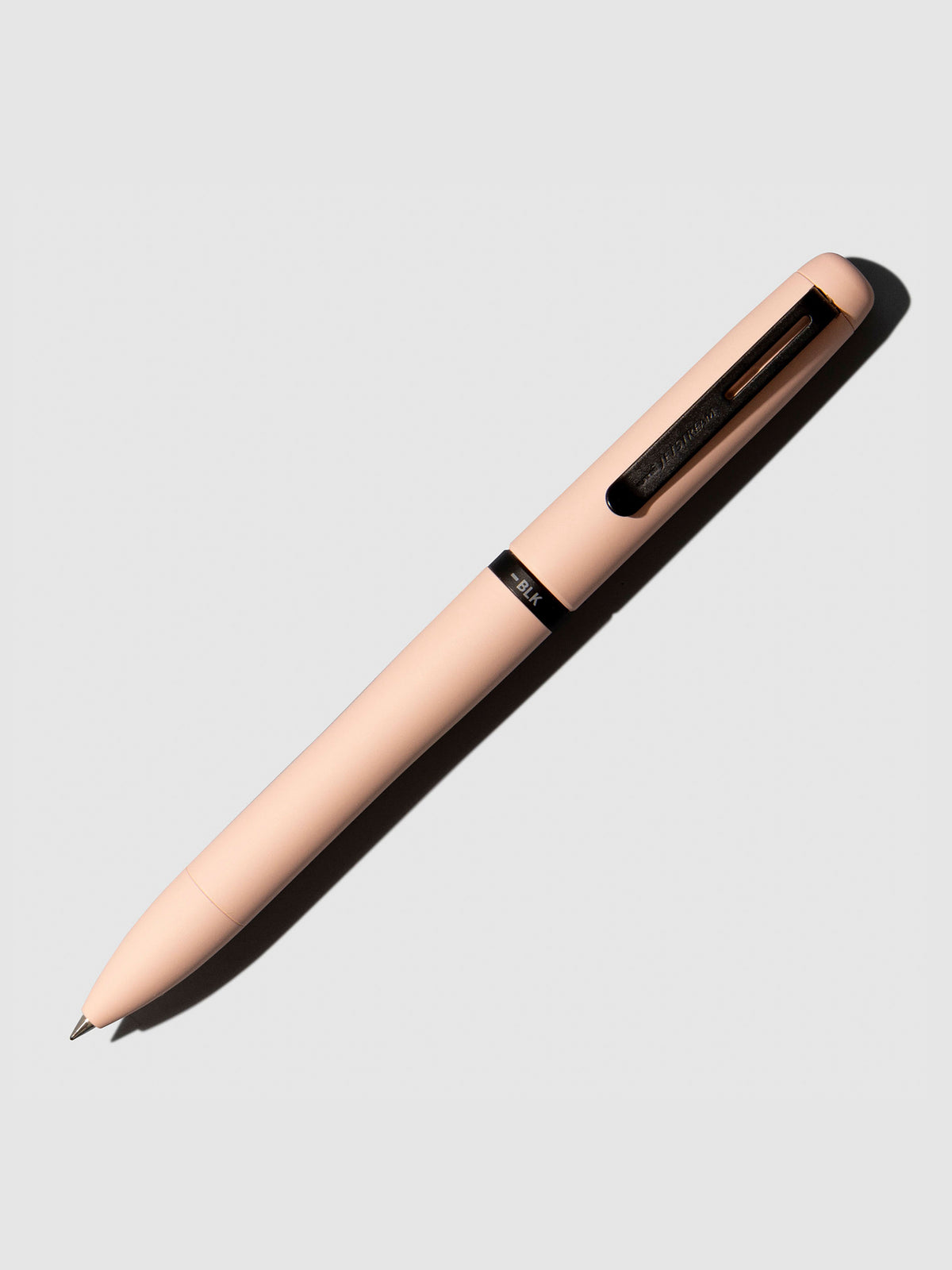 Pen shown on a neutral background with its tip exposed. Color shown is Cotton Pink.