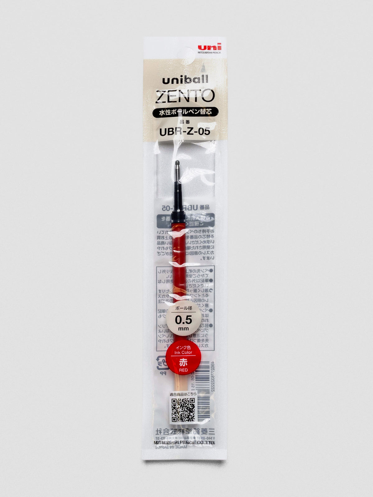 Front view of red ink 0.5 mm pen refill shown in packaging.