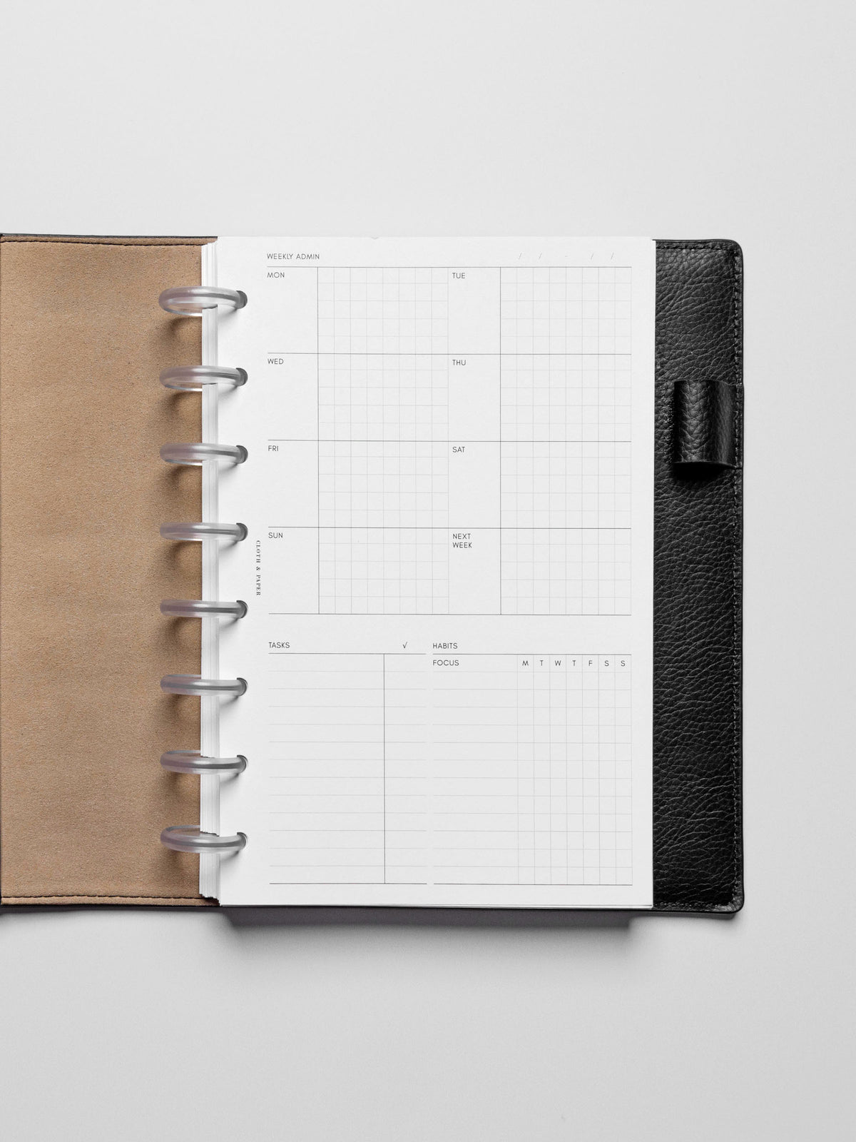 Insert in use inside a black leather planner.