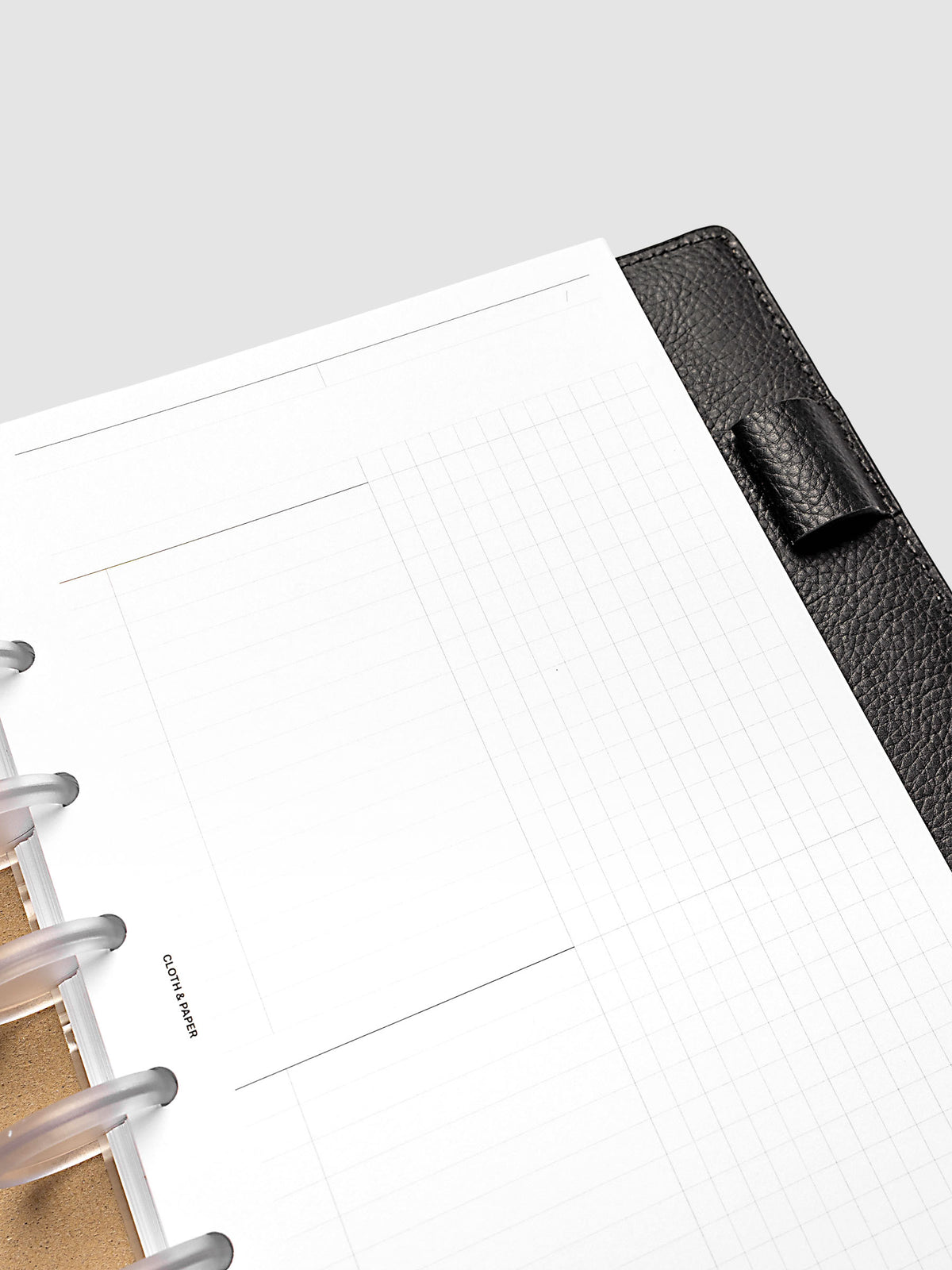 Daily Workflow Planner Inserts, Half Letter 8-Disc Punch, close-up of the top of the blank right page showing the graph layout inside a planner