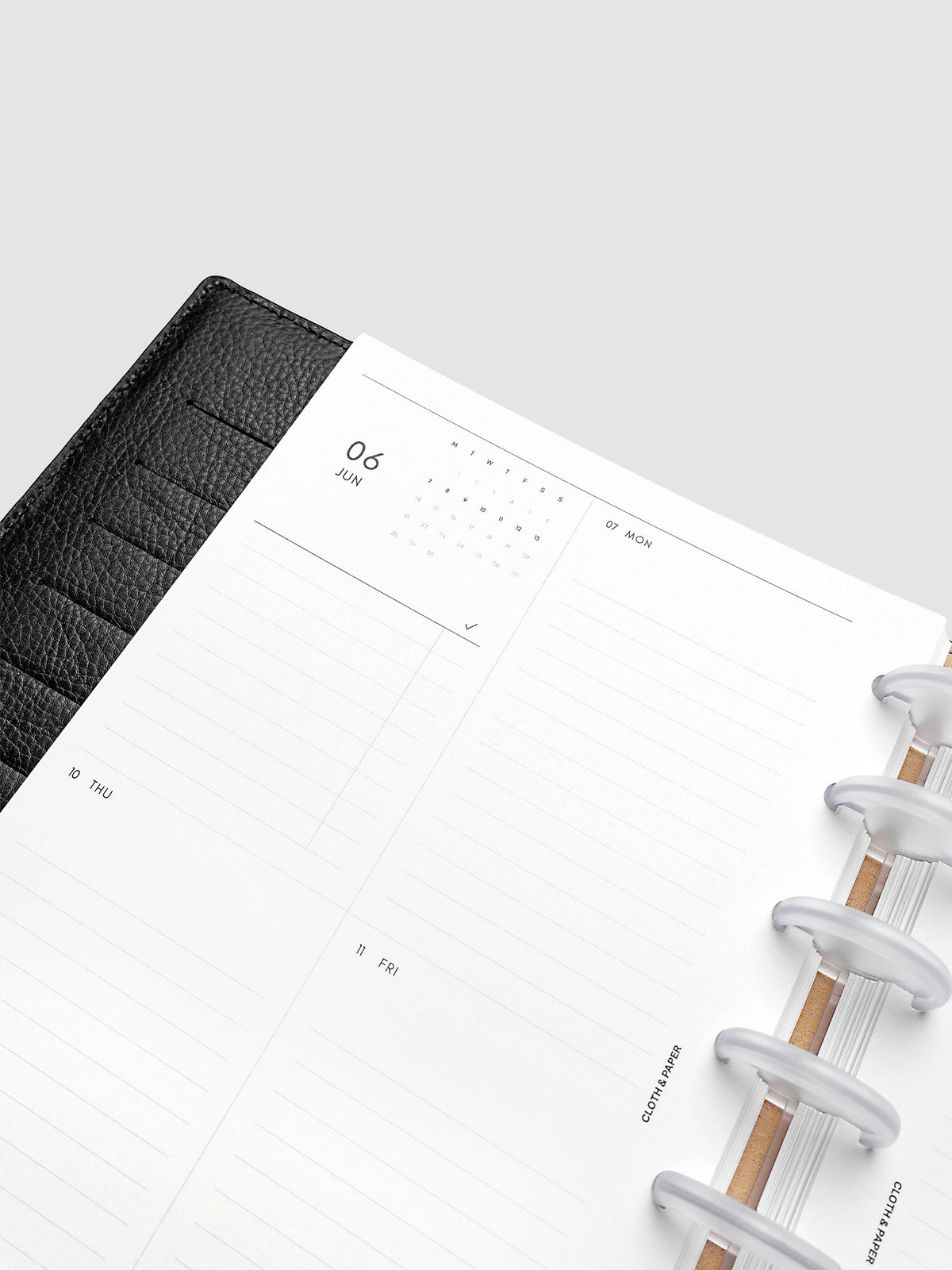 2027 Dated Weekly Vertical Planner Inserts, Monday Start, Half Letter 8-Disc Punch, close-up of the top of the left page showing the mini monthly calendar and task list alongside Monday and the upper daily grid sections