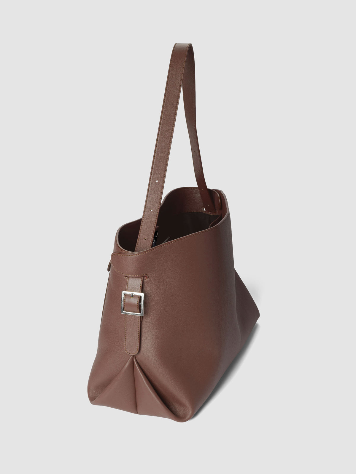 The Metro Tote in the color Cordoba shown from the side, standing.