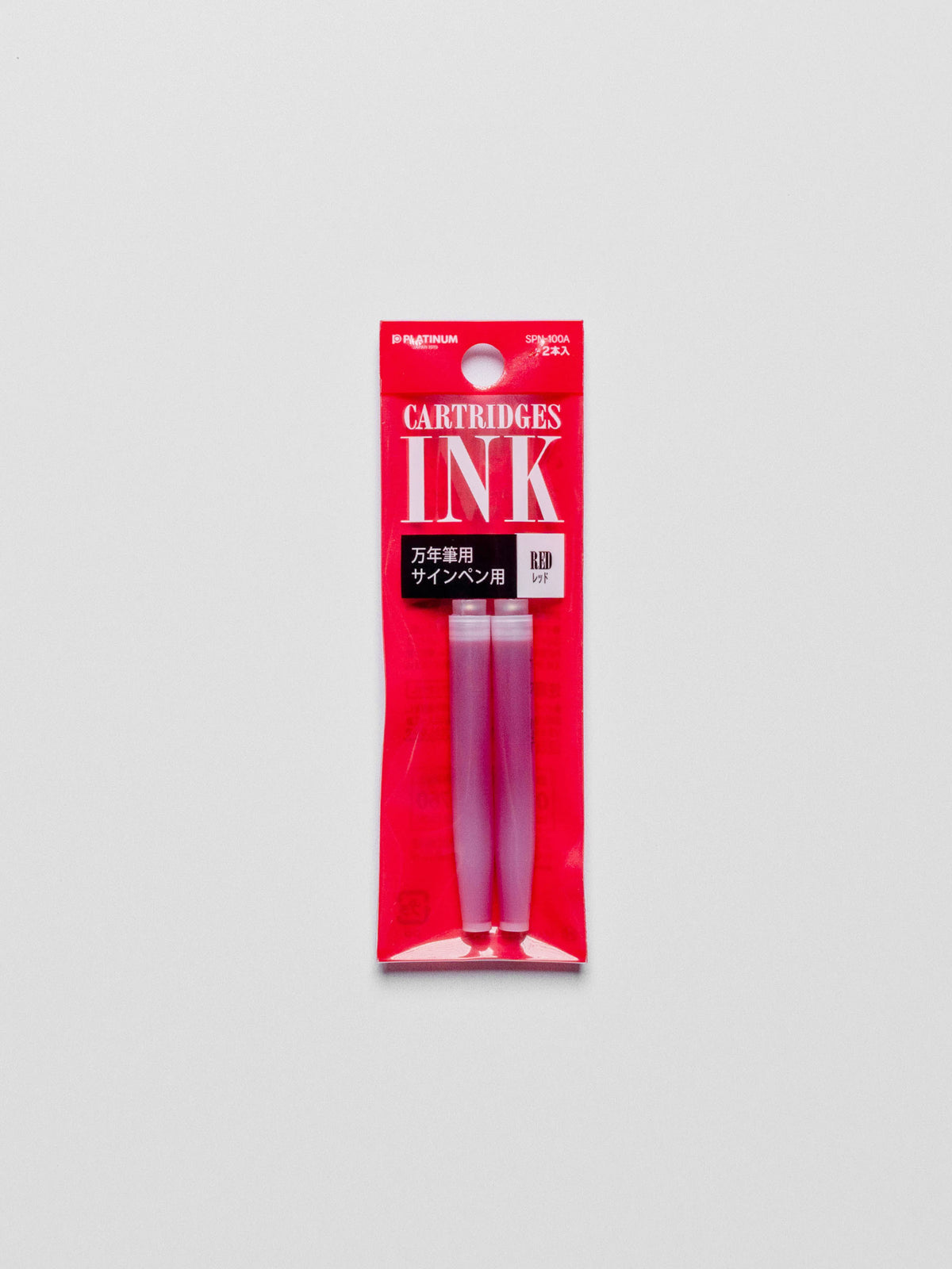 Red ink refill in its packaging displayed on a neutral background.