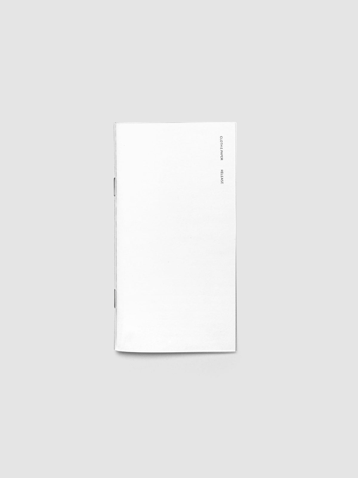 Release Paper Travel Notebook Insert shown in size Pocket Plus with white cover.