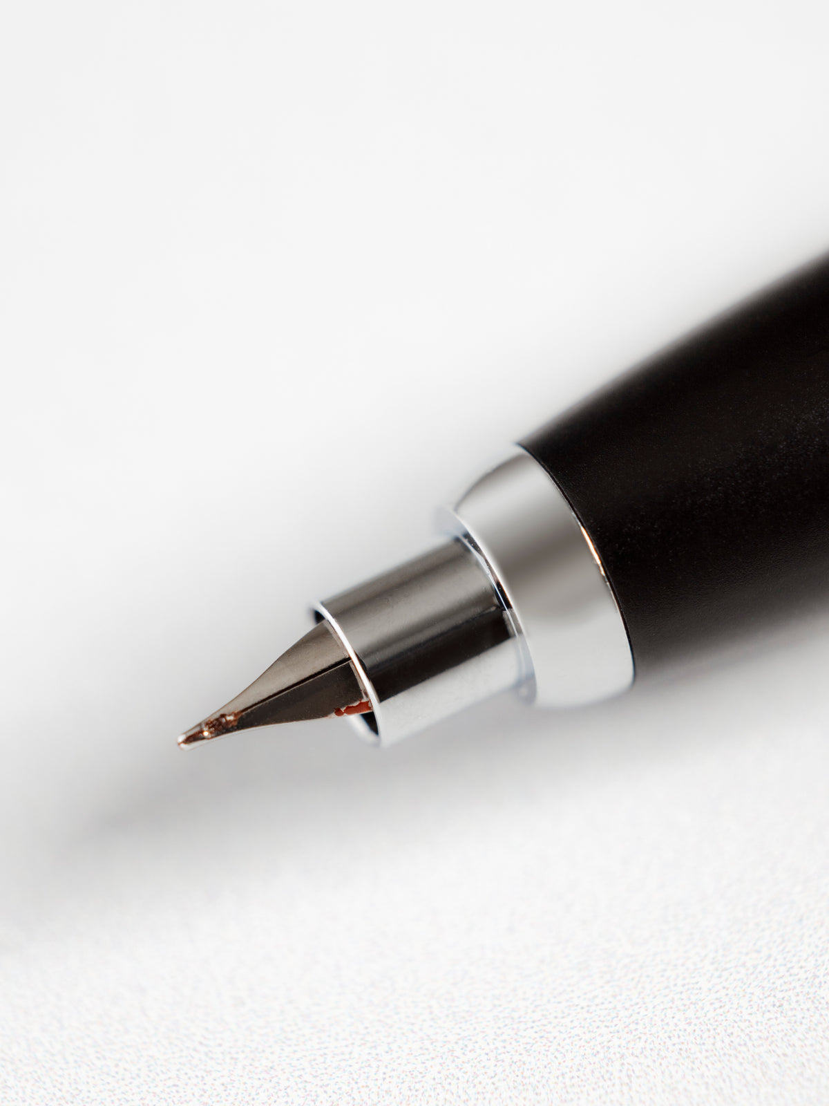 Close-up of the Lanbitou Fountain Pen hooded extra-fine nib, showing iridium tip detail