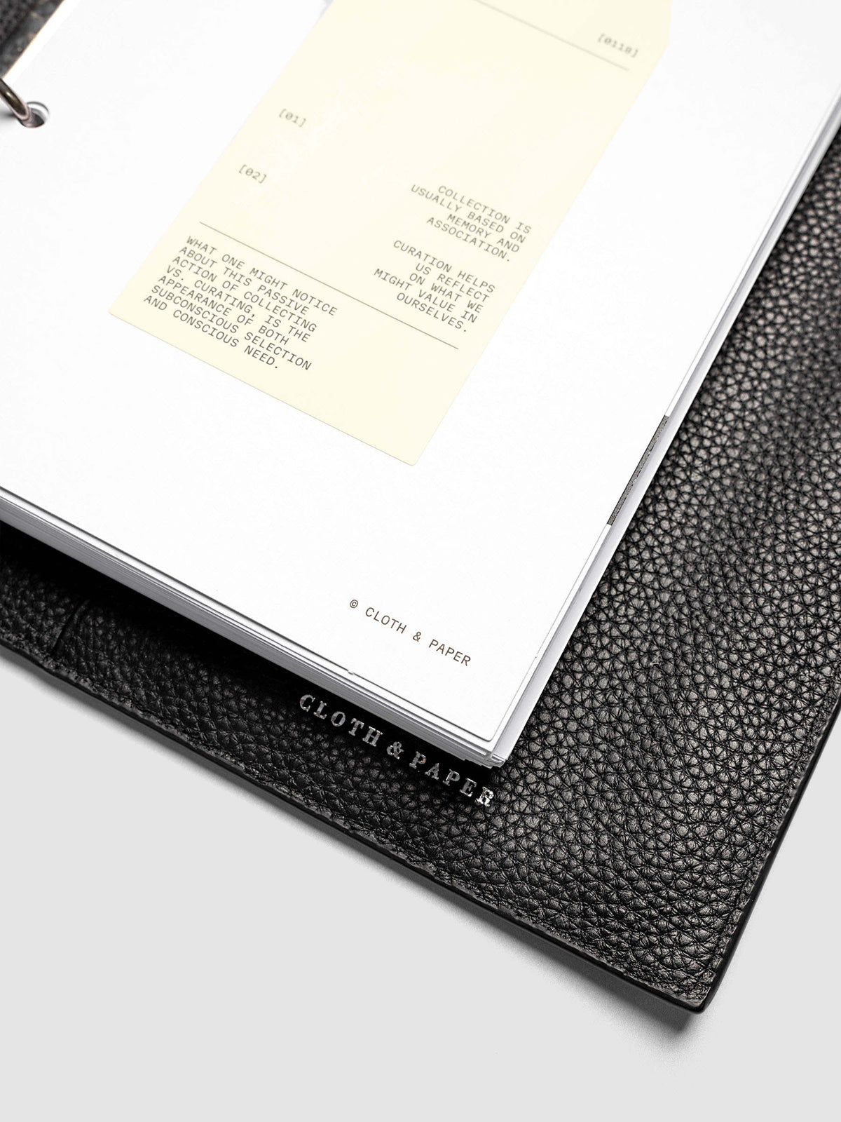 Personal Toolkit Planner Dashboard in A5 6-Ring Punch, a cardstock dashboard with an affixed warm gray printed tag in black type on a light gray background