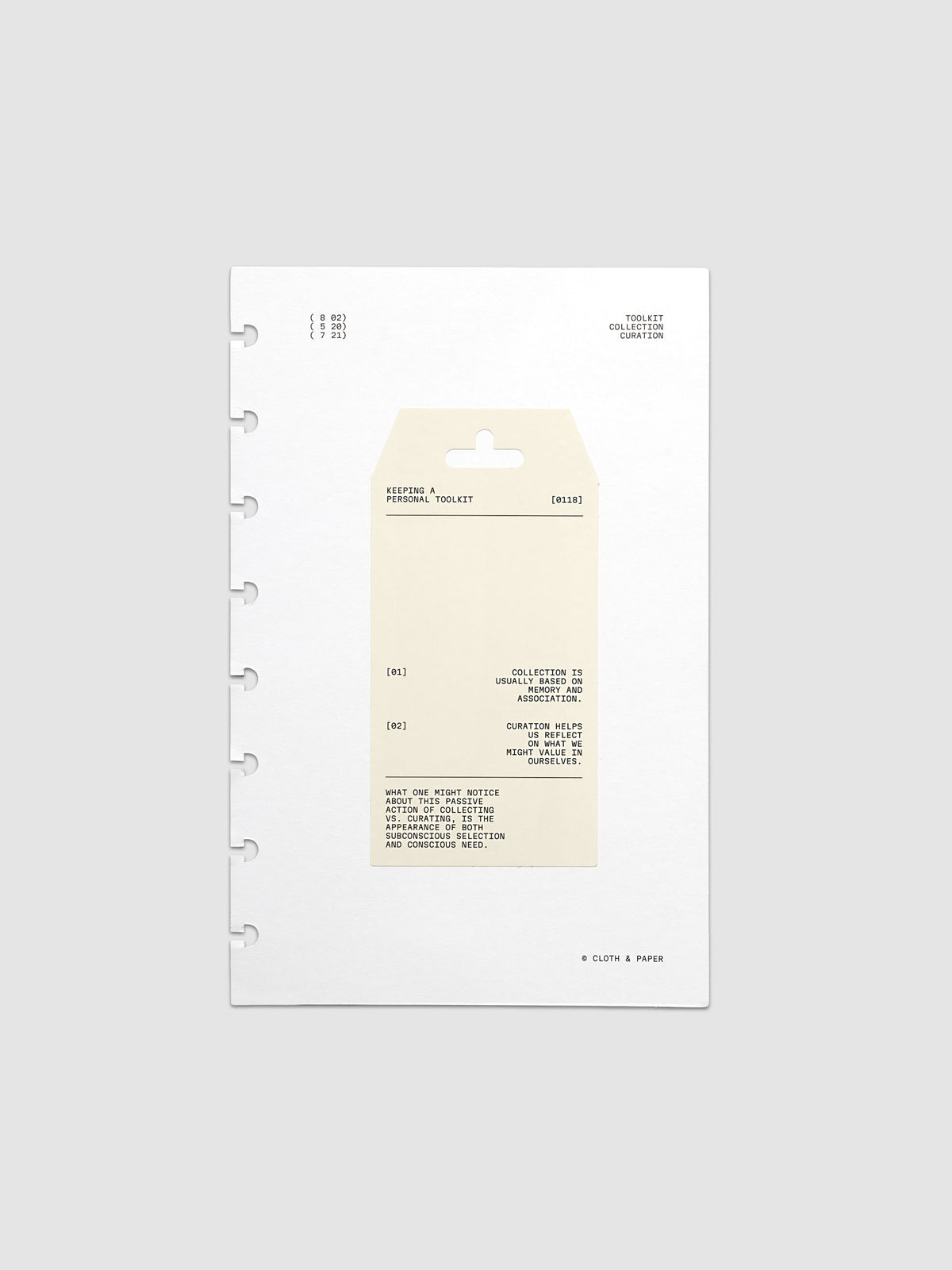 Personal Toolkit Planner Dashboard in Half Letter 8-Disc Punch, a cardstock dashboard with an affixed warm gray printed tag in black type on a light gray background