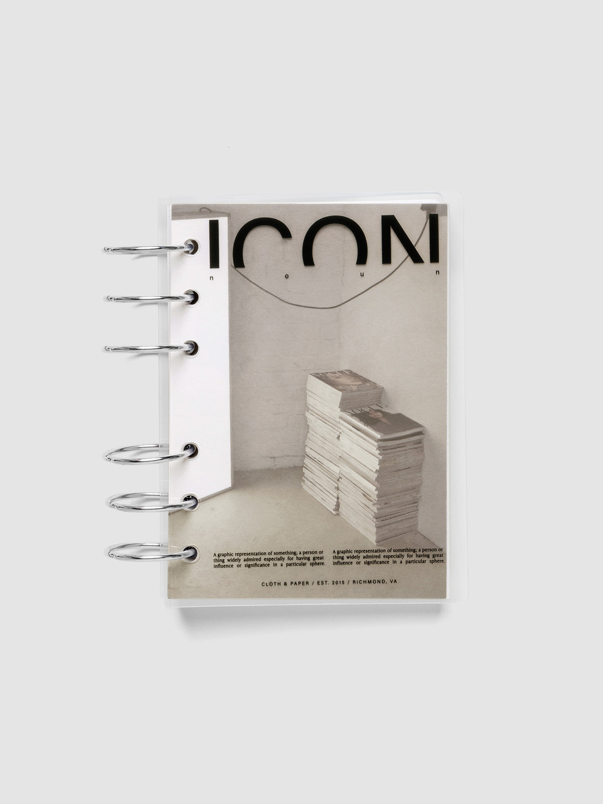Clear planner cover with black text and a photographic dashboard shown pre-punched for 6-ring planners in size A6.