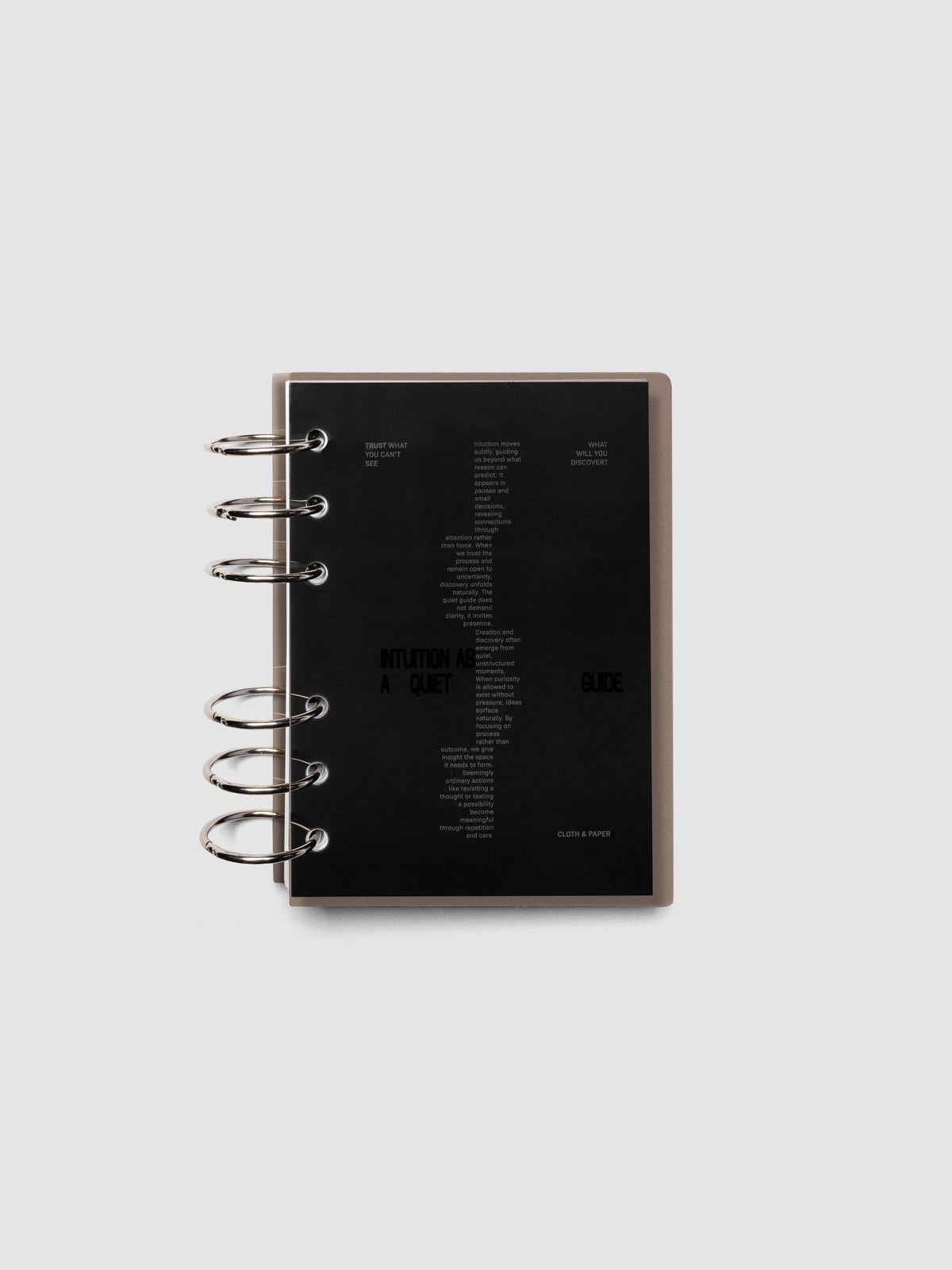 Black Intuition Ultra Thin Planner Cover + Dashboard Set in size A6 6-Ring shown inside a planner
