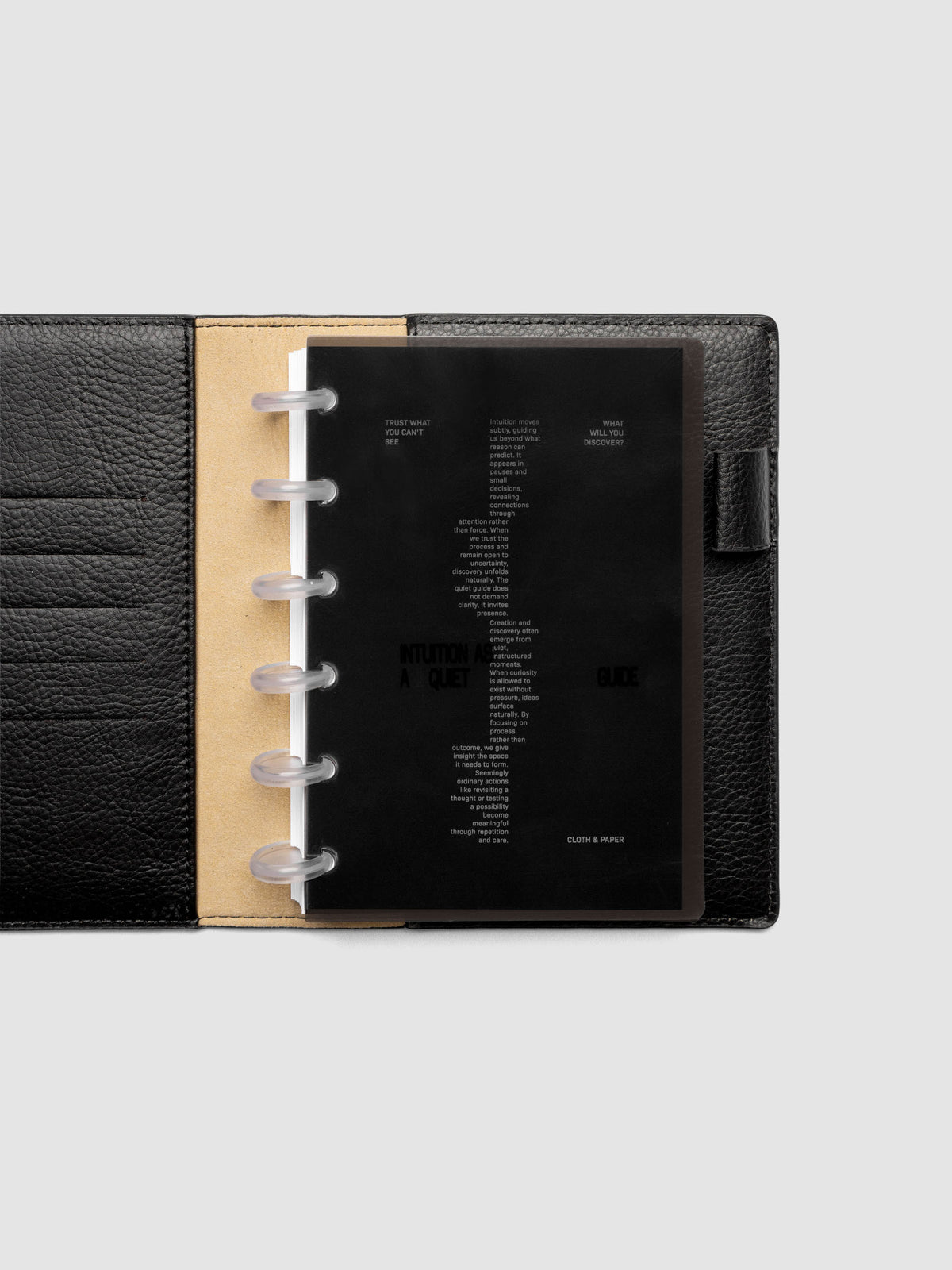 Black Intuition Ultra Thin Planner Cover + Dashboard Set in size CP Petite 6-Disc shown inside a planner